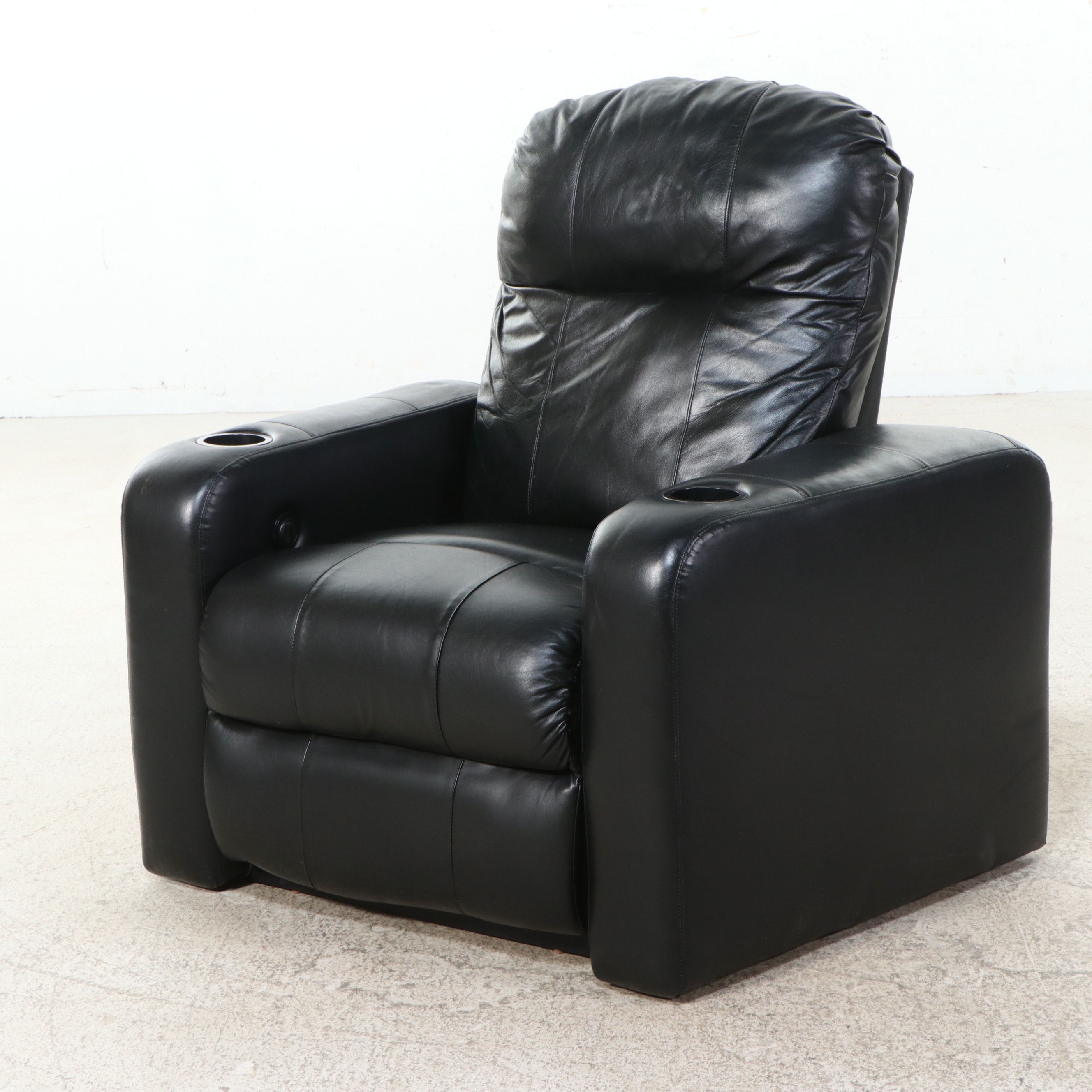 Black Leather Four-Piece Power Reclining Home Theater Seating Suite
