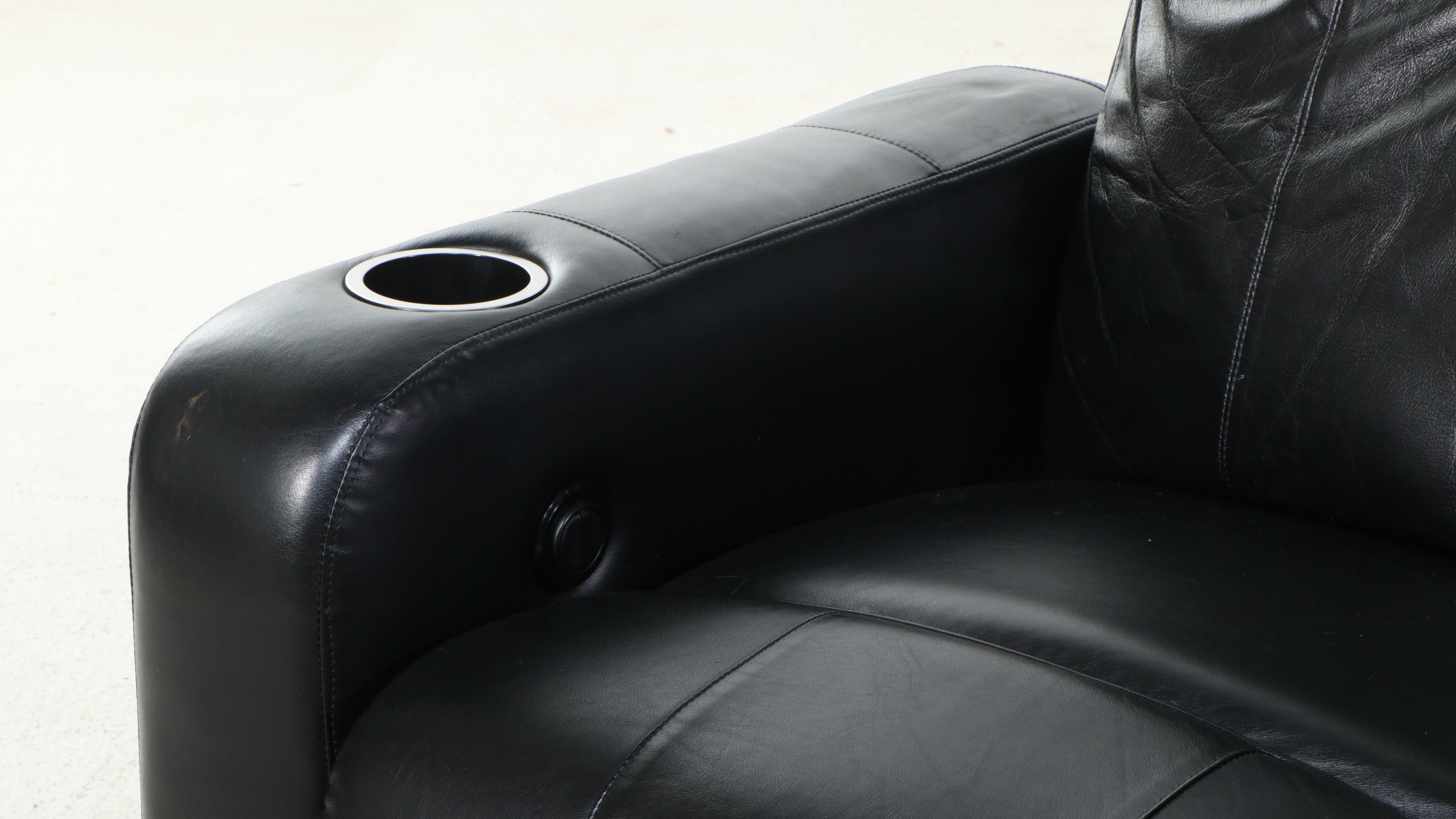 Black Leather Four-Piece Power Reclining Home Theater Seating Suite