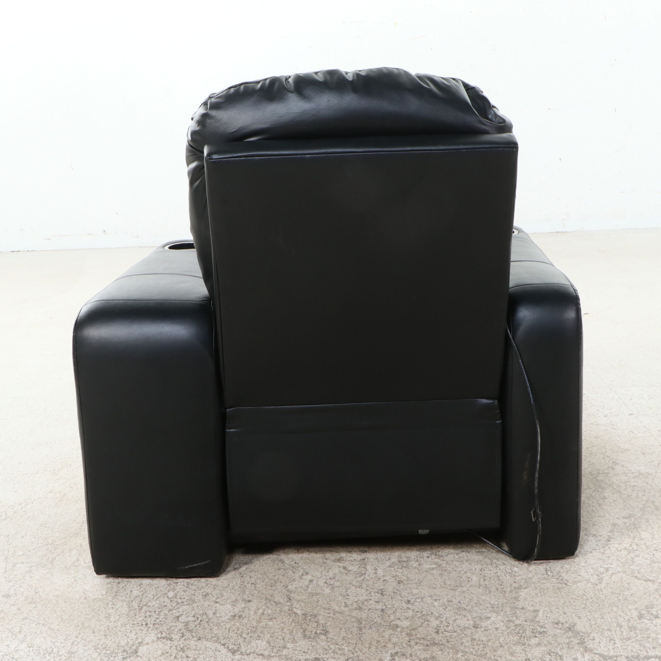 Black Leather Four-Piece Power Reclining Home Theater Seating Suite