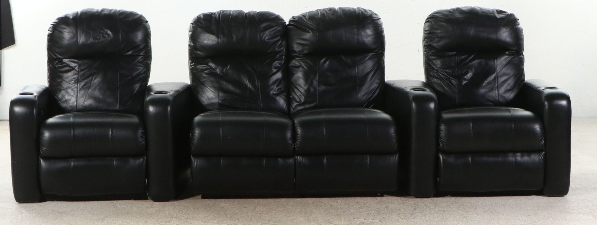 Black Leather Four-Piece Power Reclining Home Theater Seating Suite