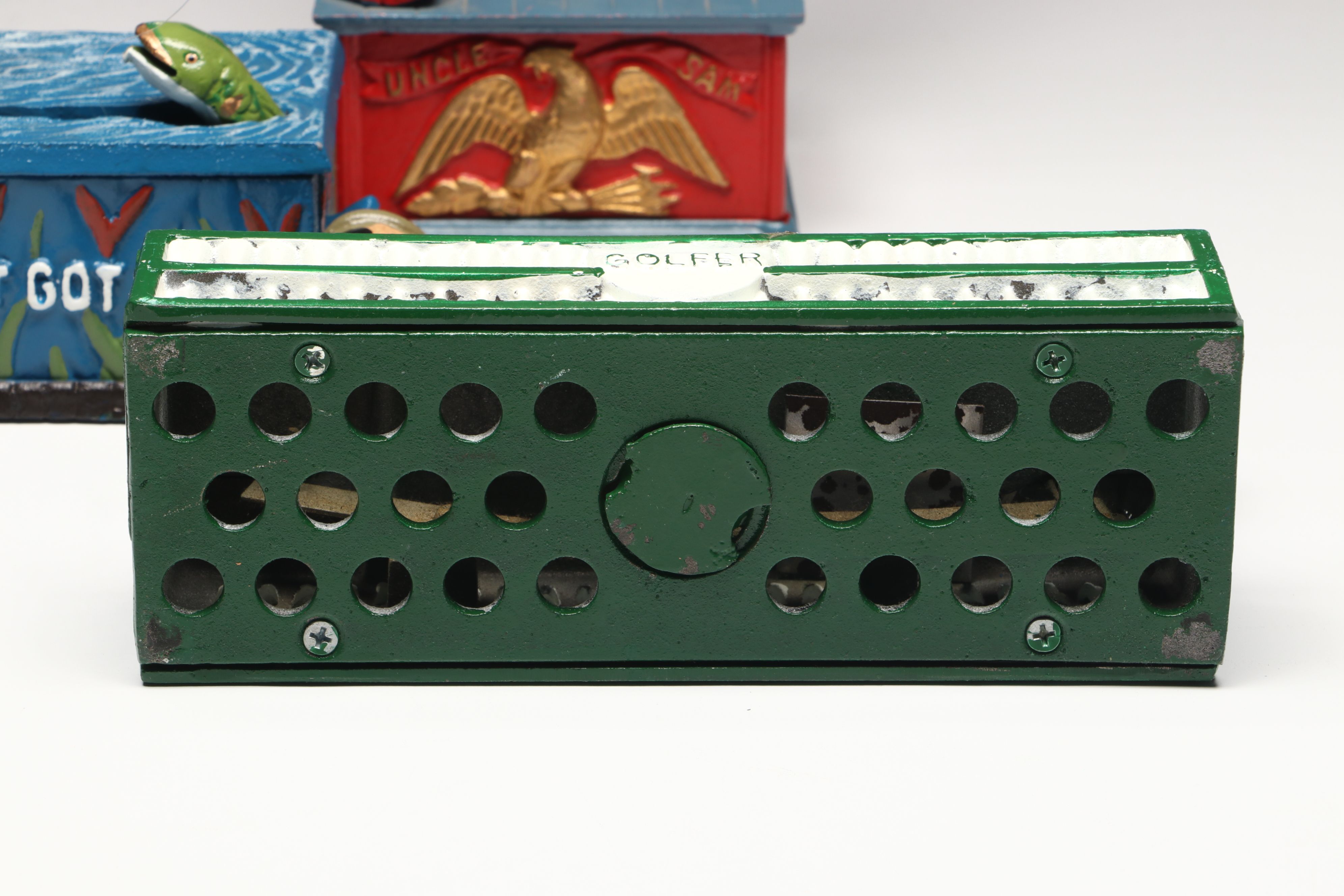 Reproduction Cold-Painted Cast Iron Uncle Sam, Golfer and Fishing Coin Banks