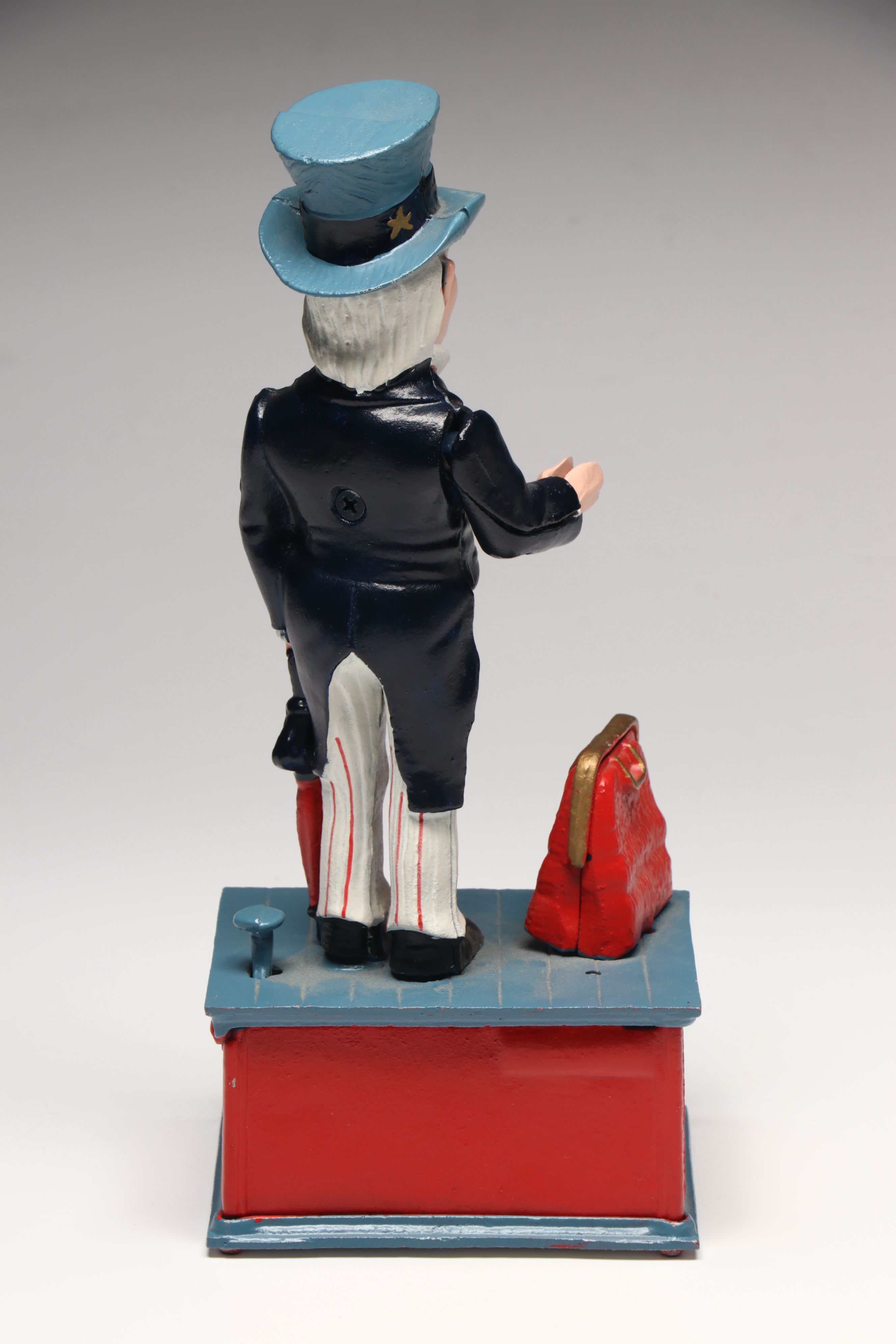 Reproduction Cold-Painted Cast Iron Uncle Sam, Golfer and Fishing Coin Banks