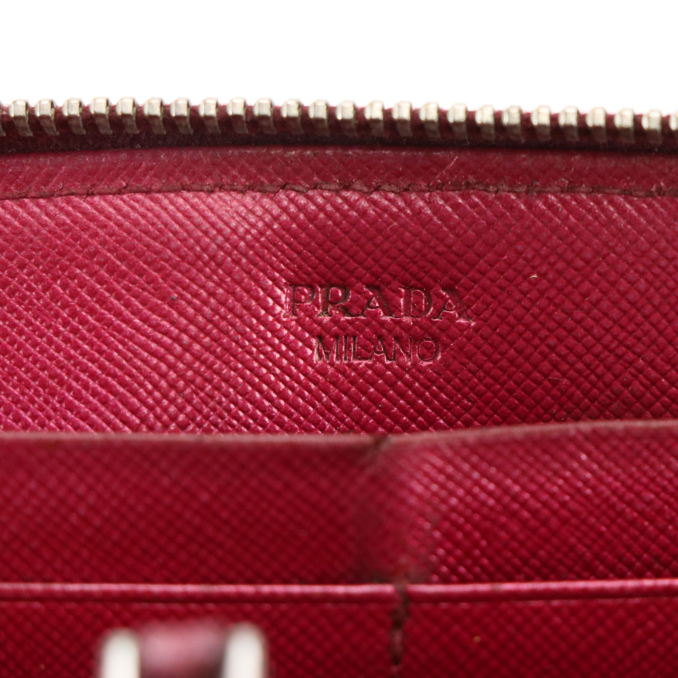 Prada Zip Around Wallet in Shiny Magenta Saffiano Leather