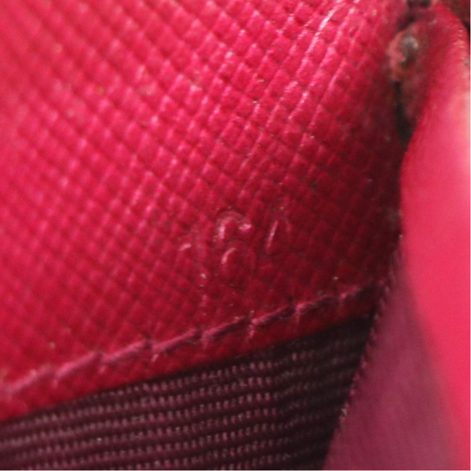 Prada Zip Around Wallet in Shiny Magenta Saffiano Leather