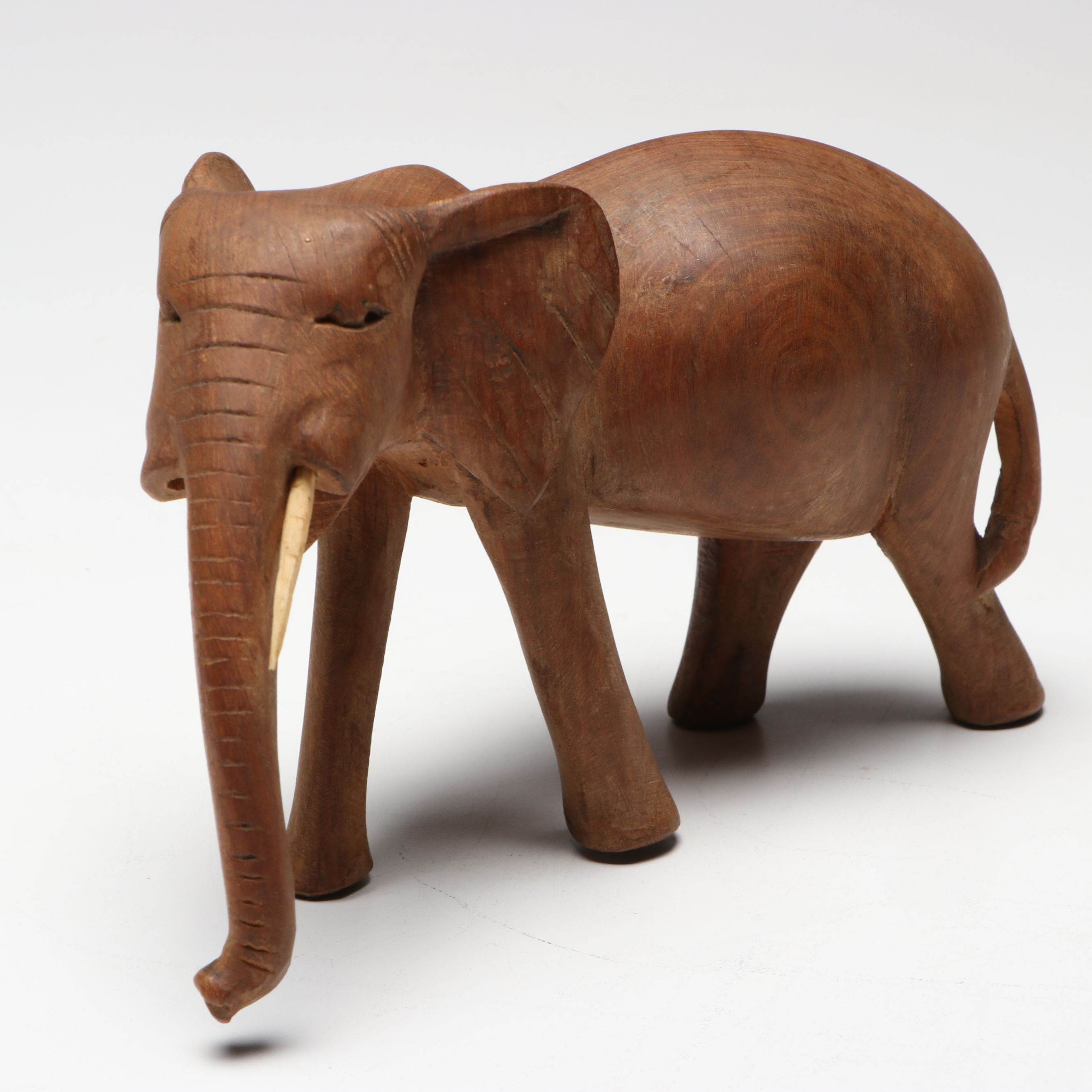 Folk Art Style Carved Wooden Lion, Elephant, Tiger and Warthog Figurines