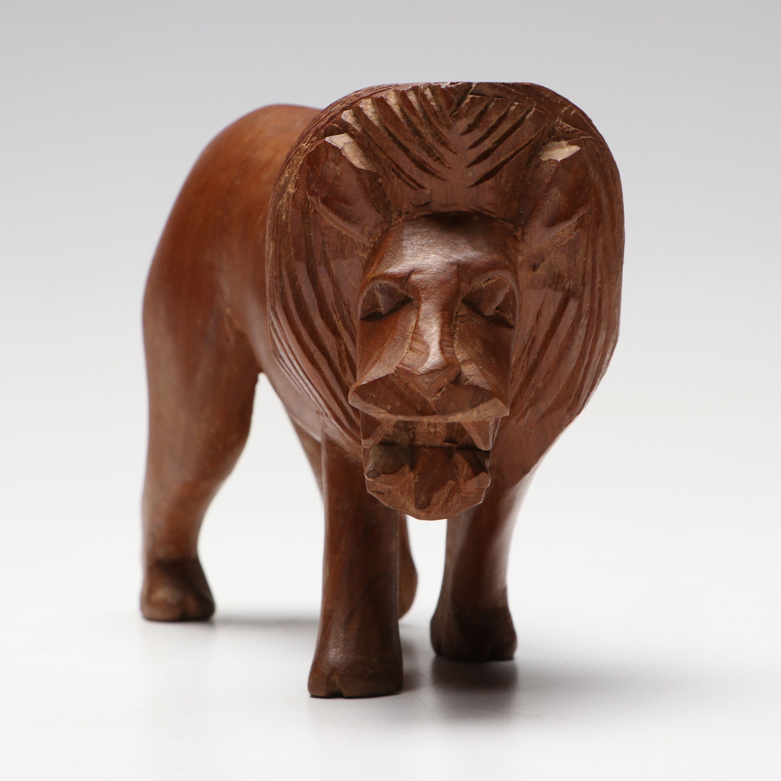 Folk Art Style Carved Wooden Lion, Elephant, Tiger and Warthog Figurines