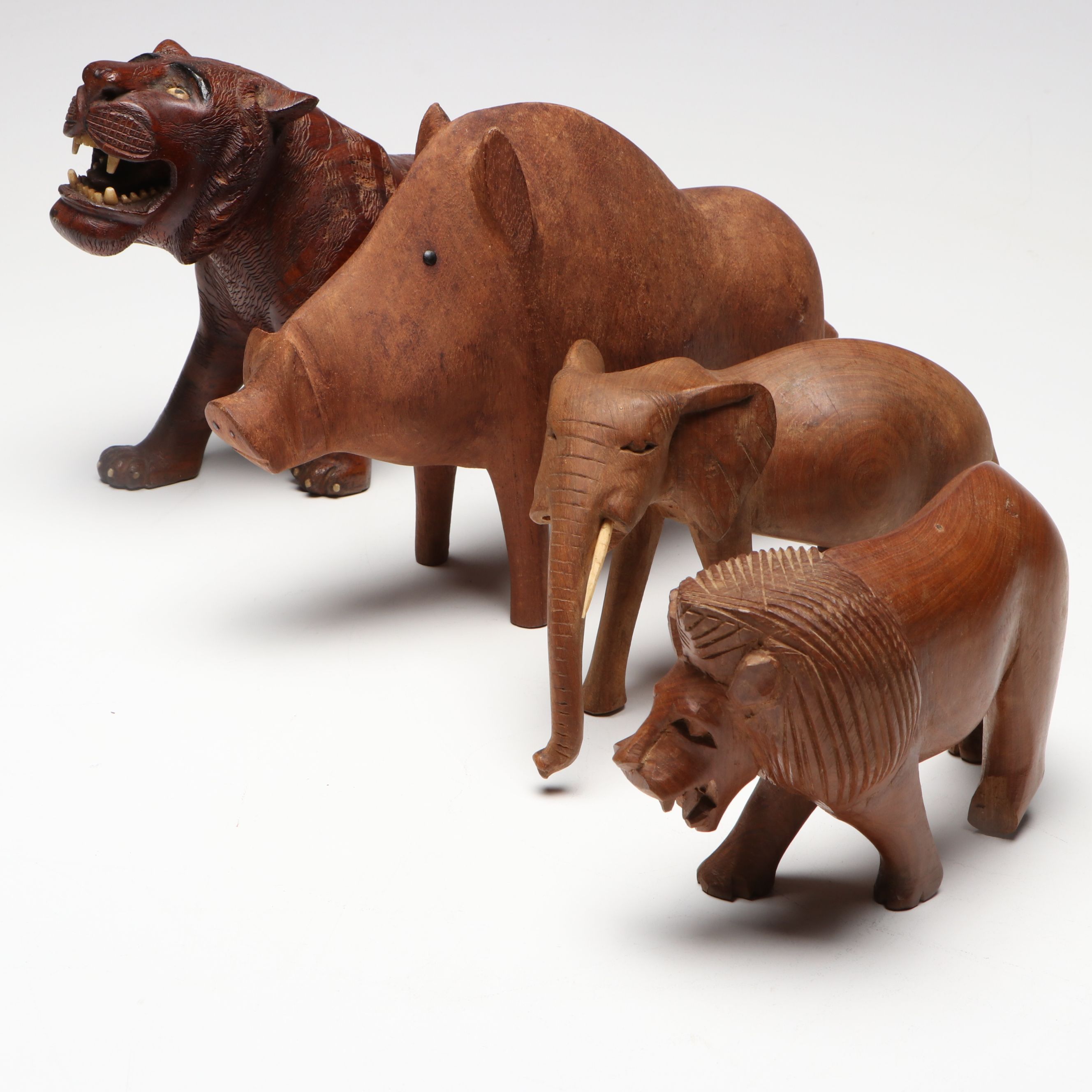 Folk Art Style Carved Wooden Lion, Elephant, Tiger and Warthog Figurines