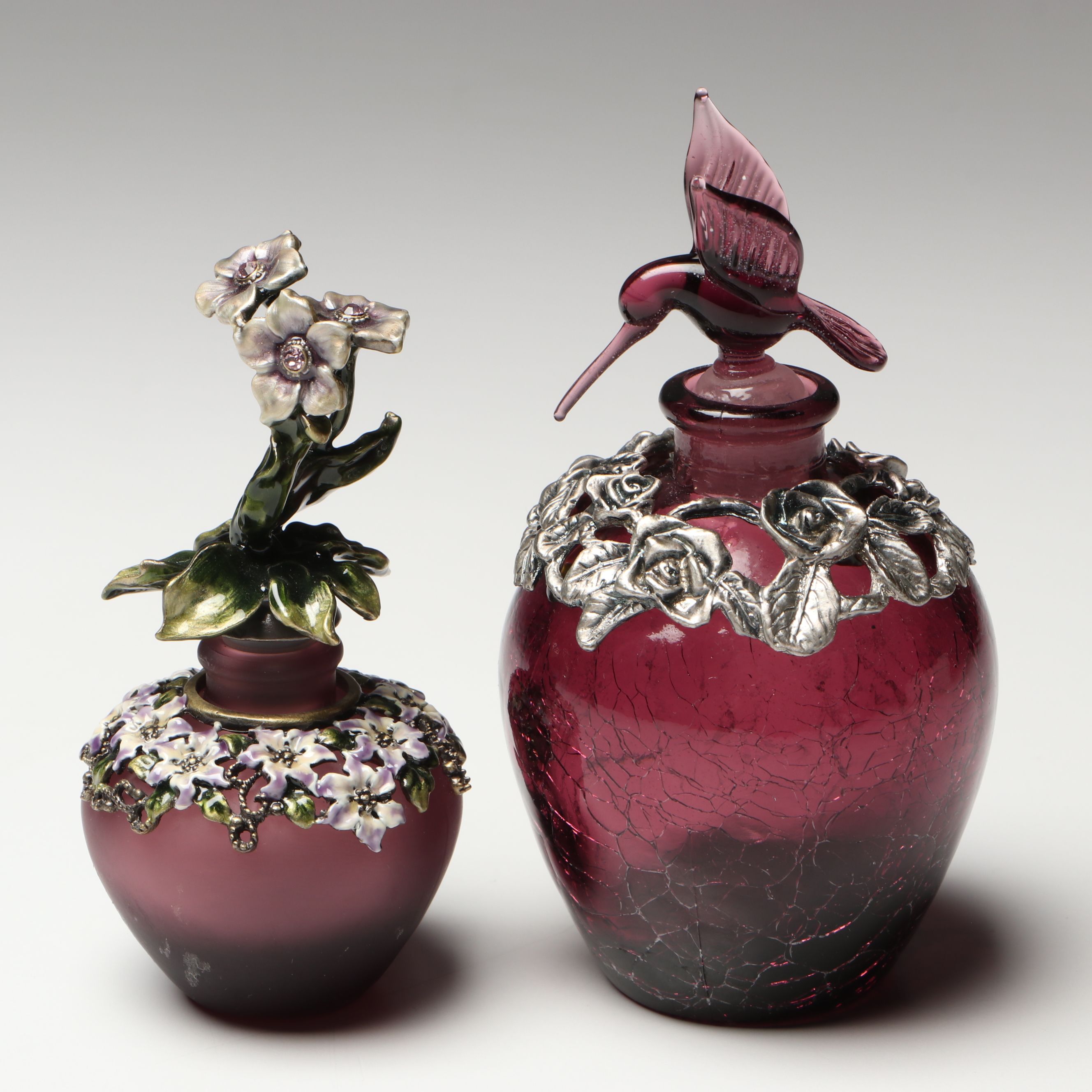 Purple and Cranberry Perfume Bottles with Floral and Hummingbird Finials