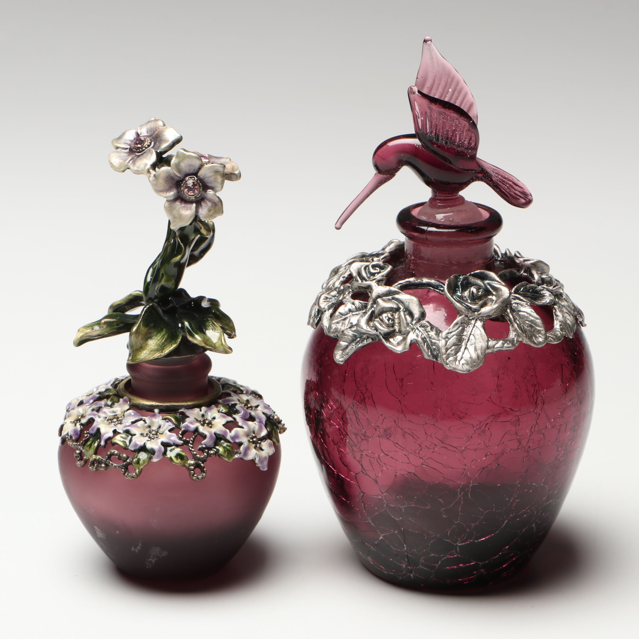 Purple and Cranberry Perfume Bottles with Floral and Hummingbird Finials