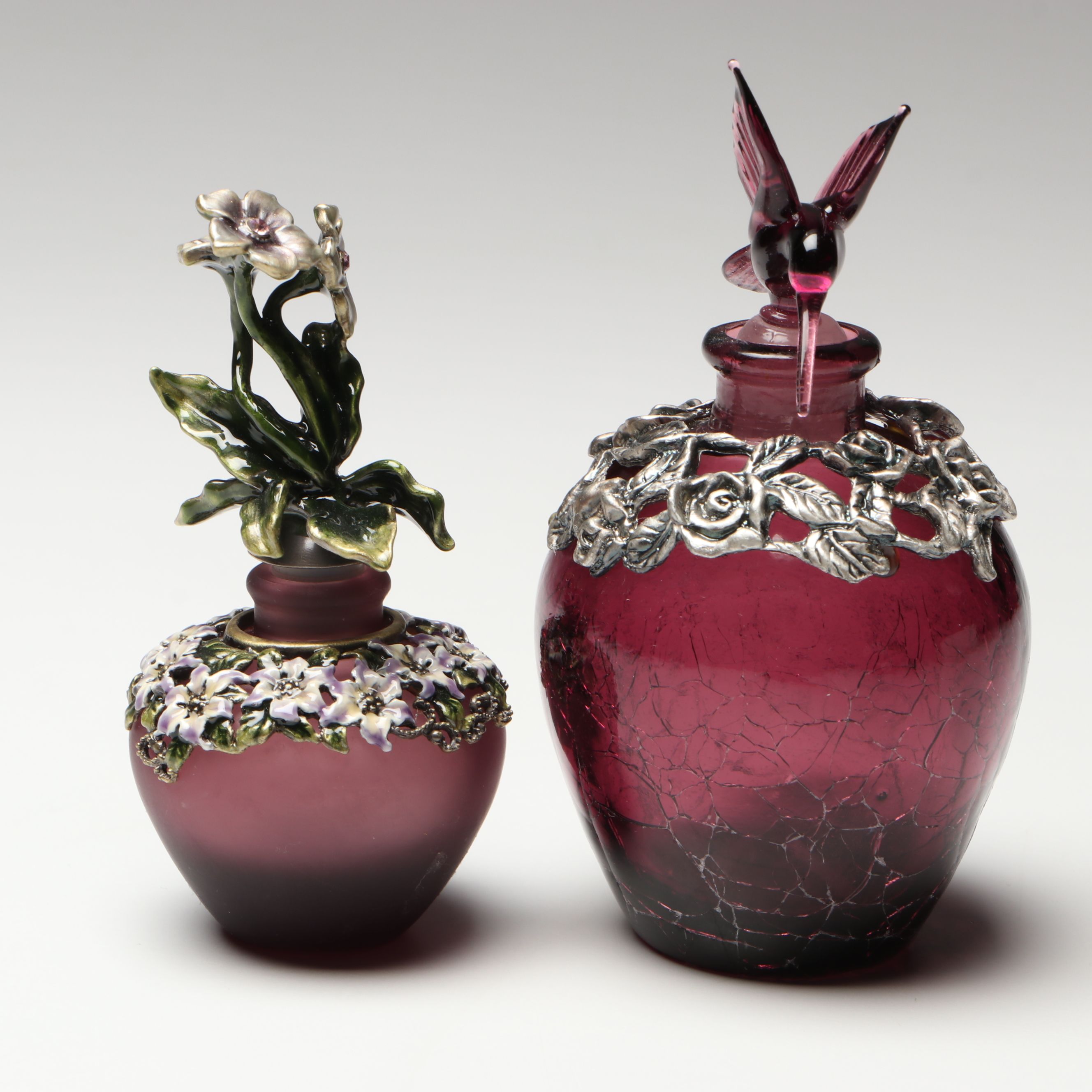 Purple and Cranberry Perfume Bottles with Floral and Hummingbird Finials