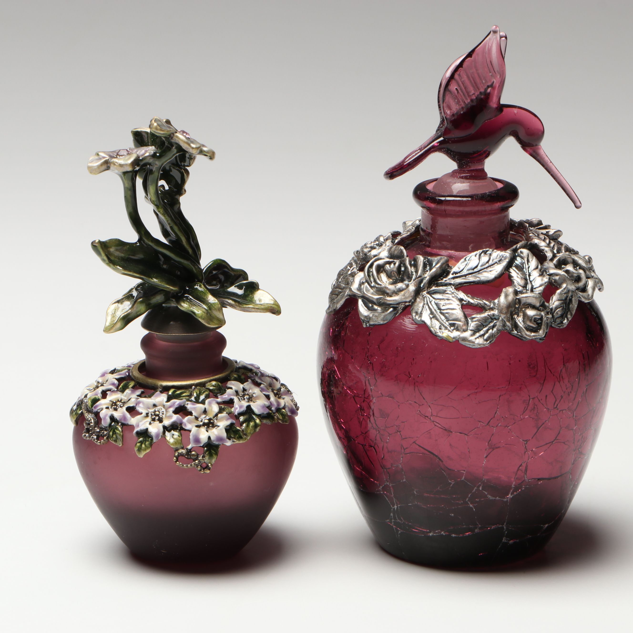 Purple and Cranberry Perfume Bottles with Floral and Hummingbird Finials