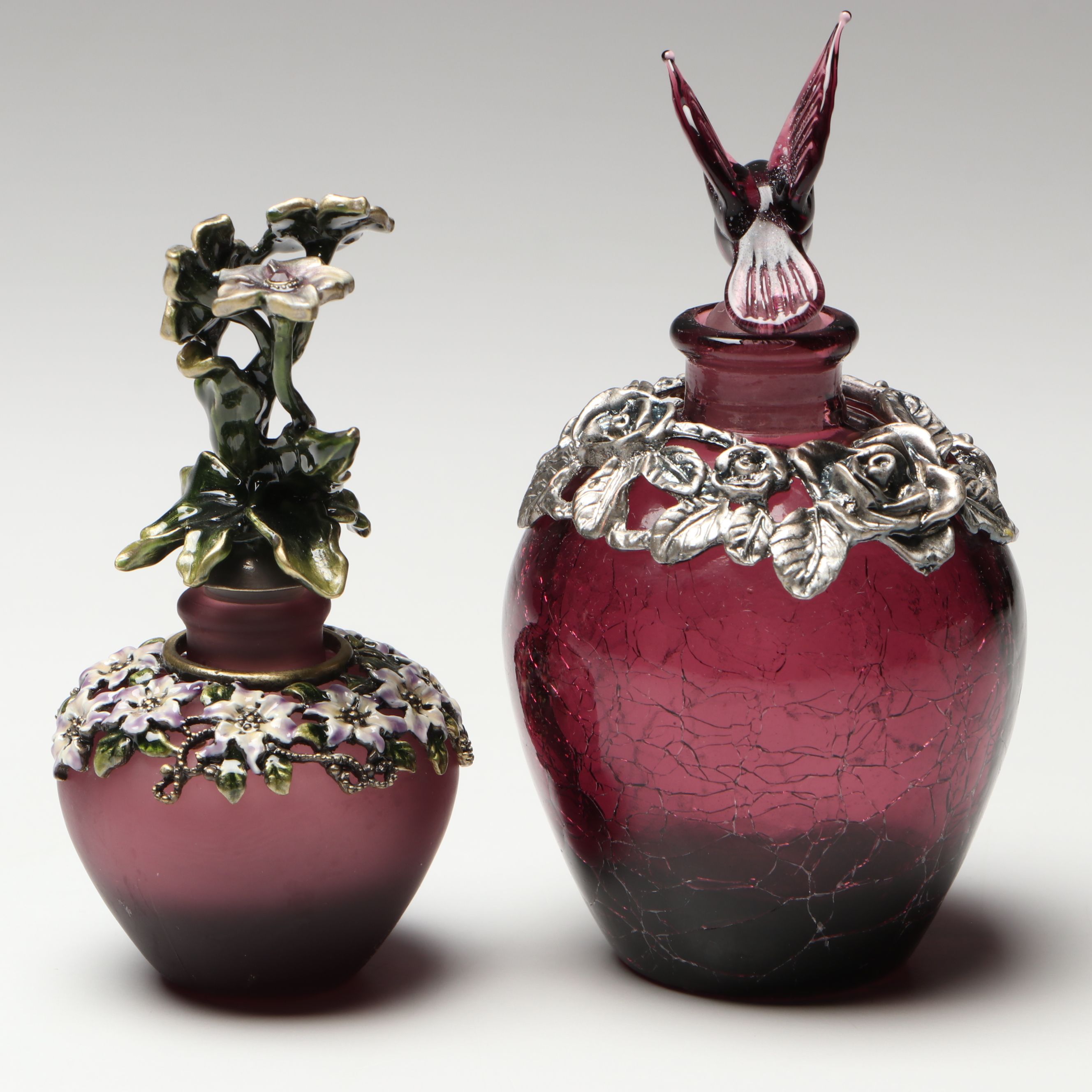 Purple and Cranberry Perfume Bottles with Floral and Hummingbird Finials