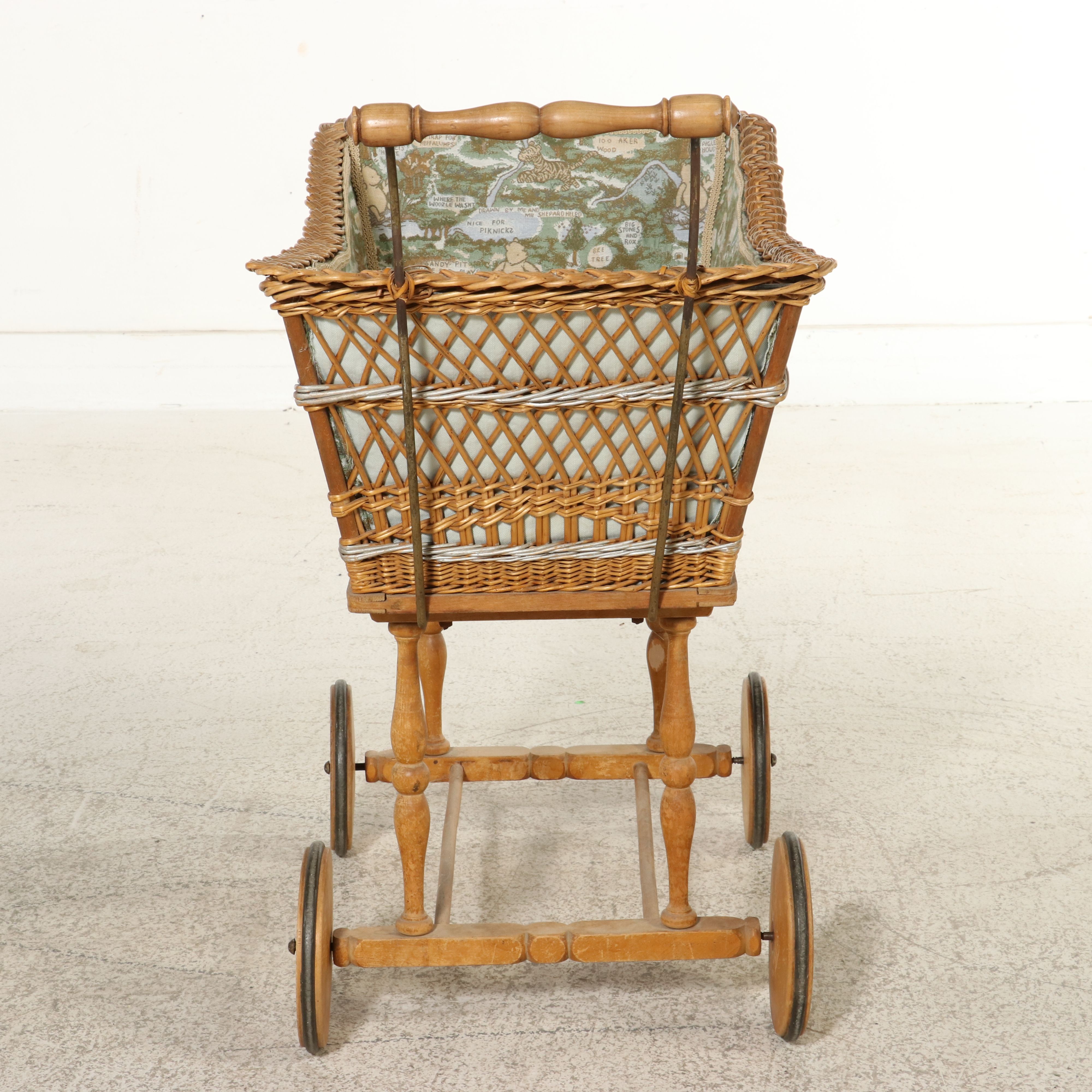Victorian-Style Wicker Baby Carriage with "Winnie the Pooh" Tapestry Lining