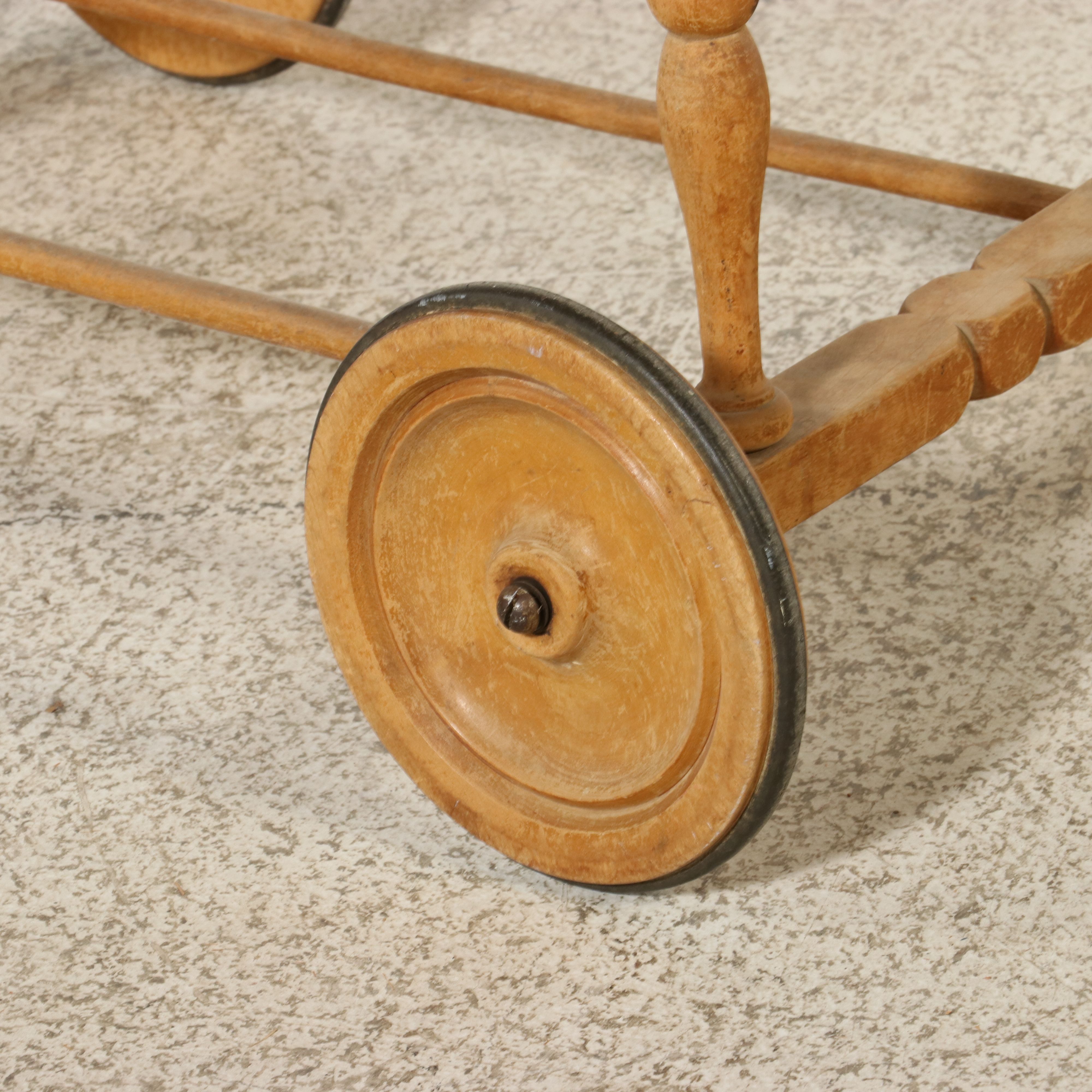Victorian-Style Wicker Baby Carriage with "Winnie the Pooh" Tapestry Lining