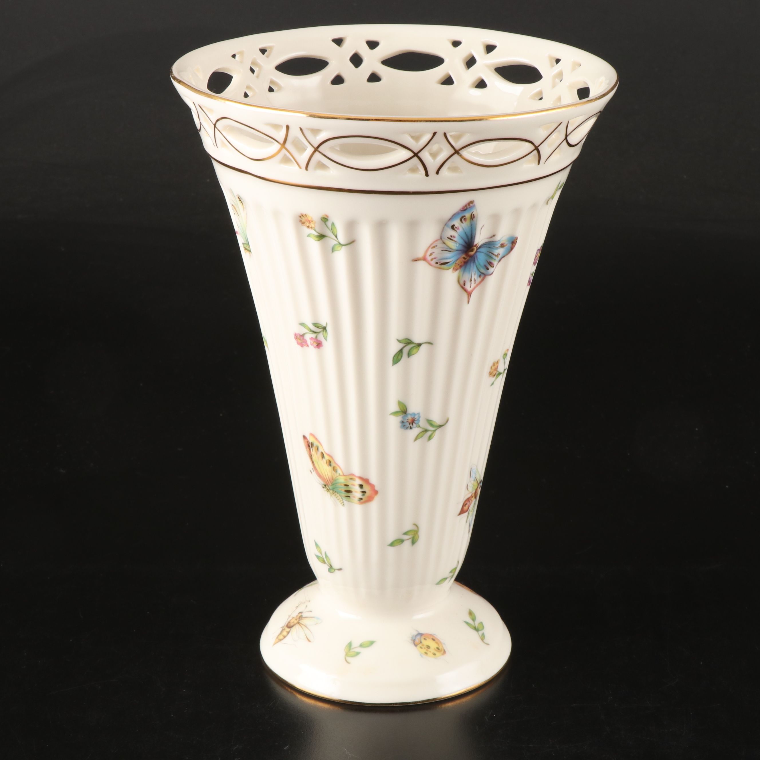 Burton & Burton Ceramic Floral Trumpet Vase with Other Candlesticks and Stemware