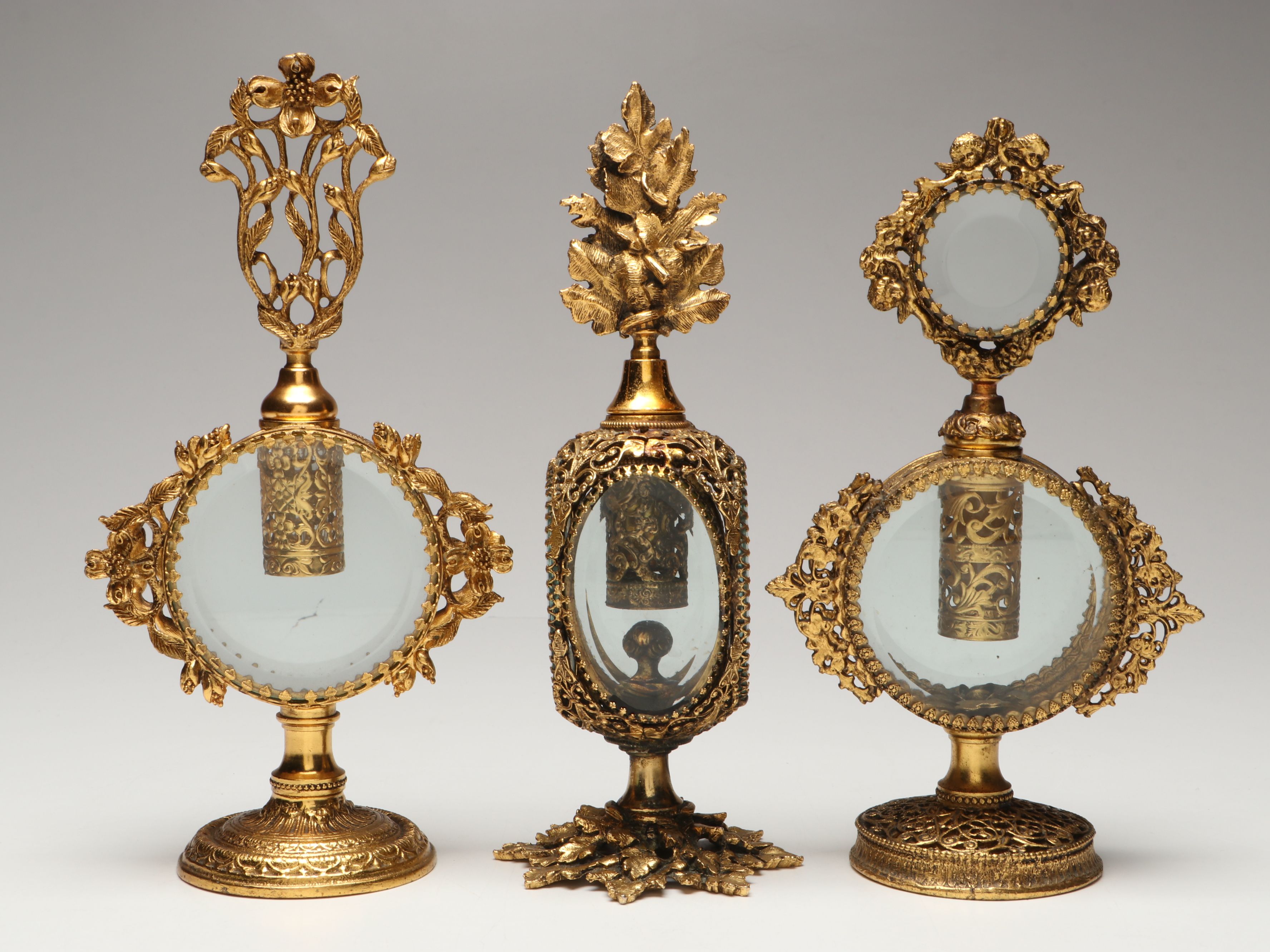 Gilt Metal Filigree and Beveled Glass Perfume Bottles with Jewelry Casket