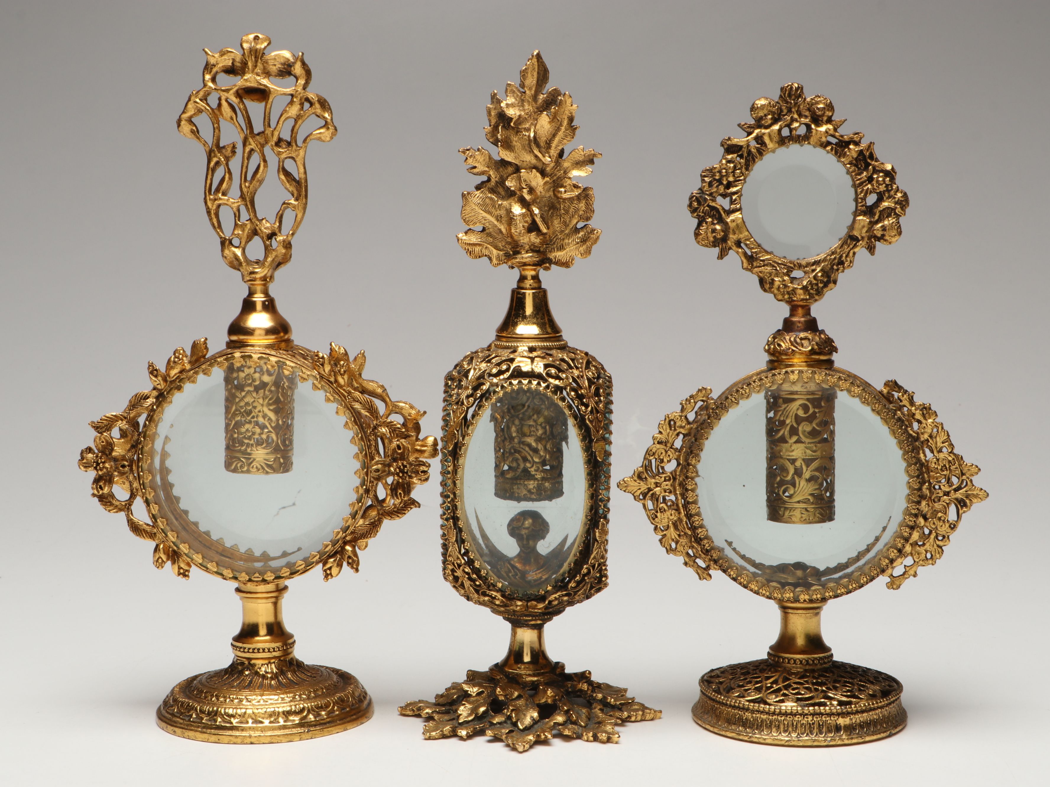 Gilt Metal Filigree and Beveled Glass Perfume Bottles with Jewelry Casket