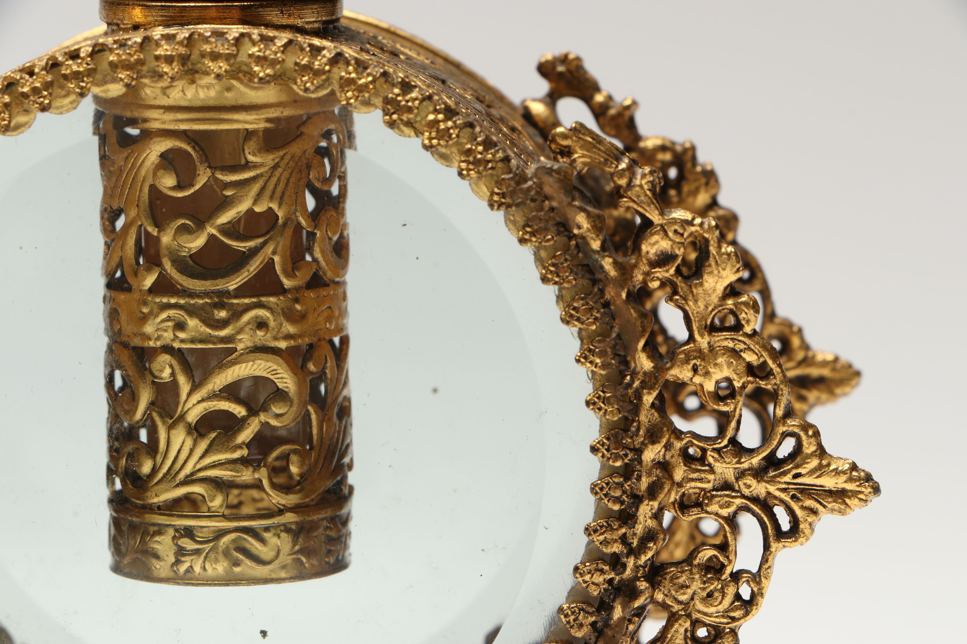 Gilt Metal Filigree and Beveled Glass Perfume Bottles with Jewelry Casket