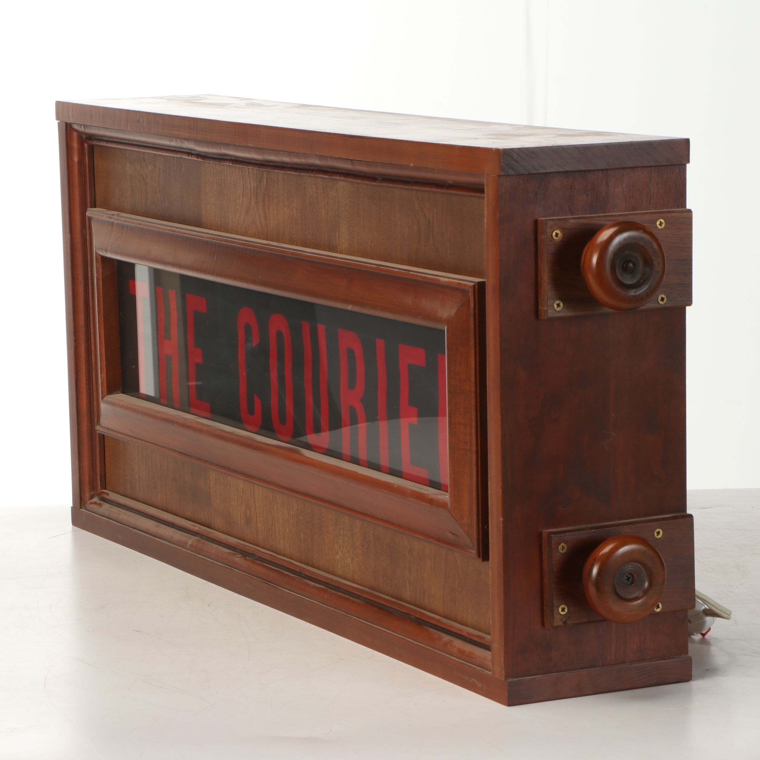 Illuminated "The Courier" Newspaper Advertising Sign