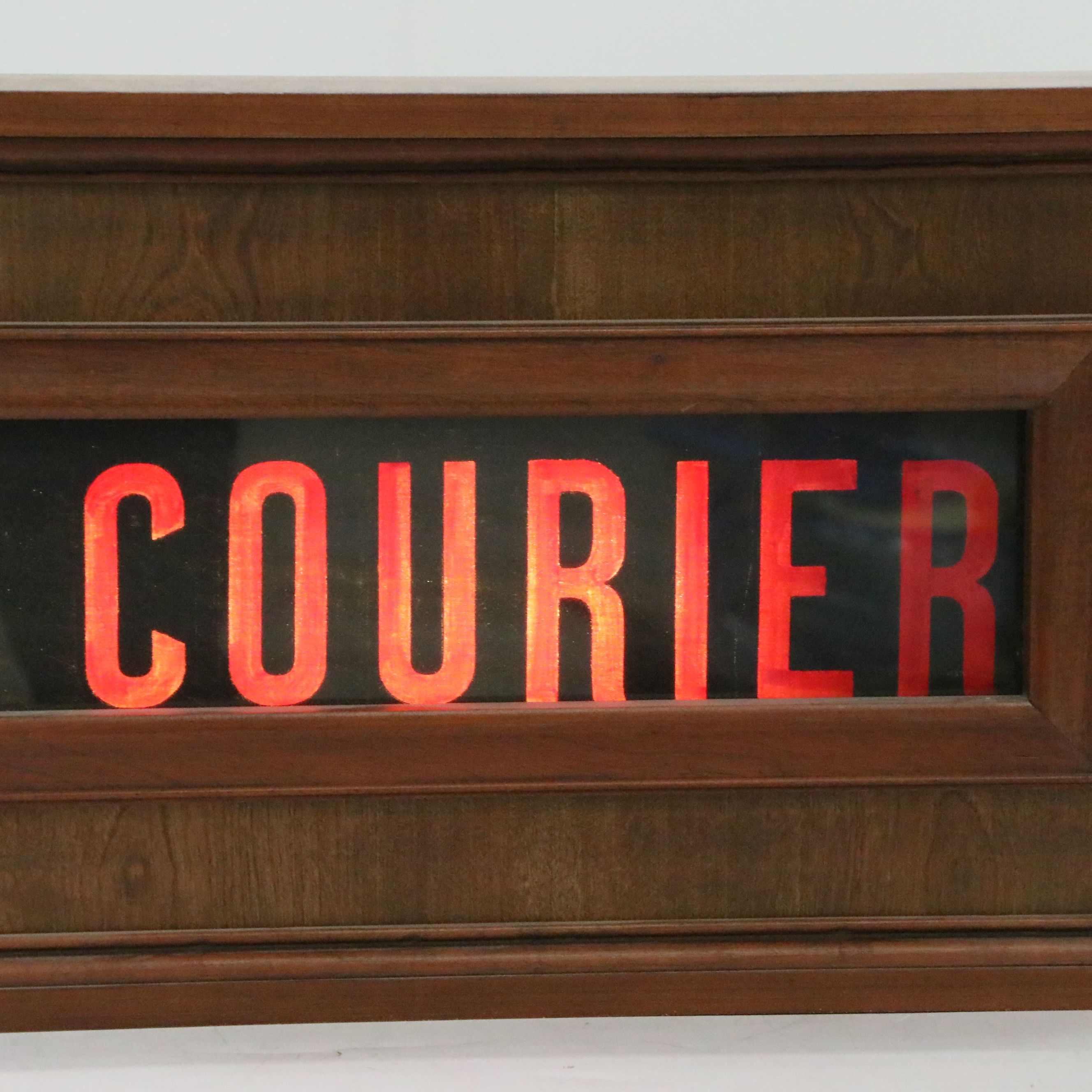 Illuminated "The Courier" Newspaper Advertising Sign