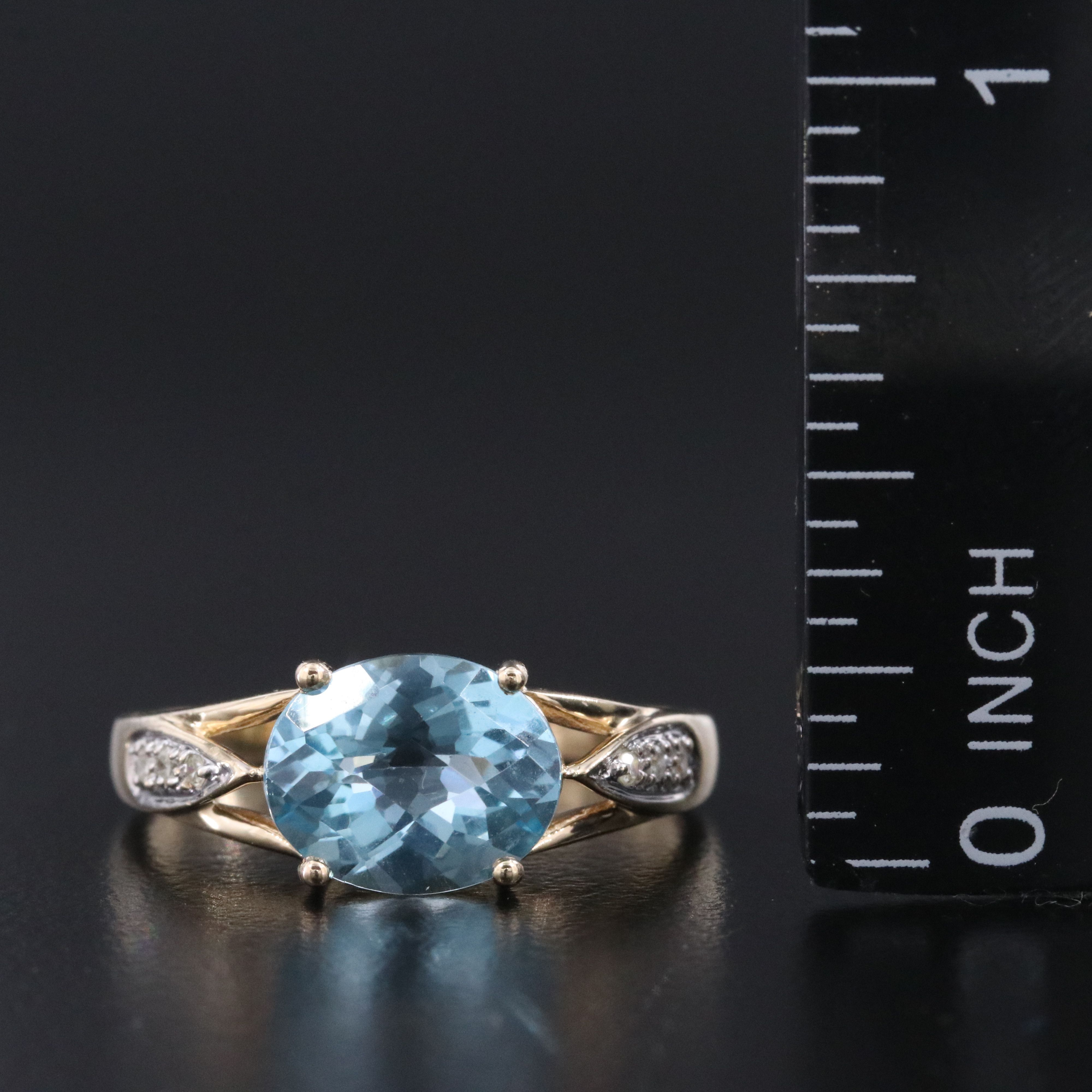 10K Swiss Blue Topaz and Diamond East West Ring