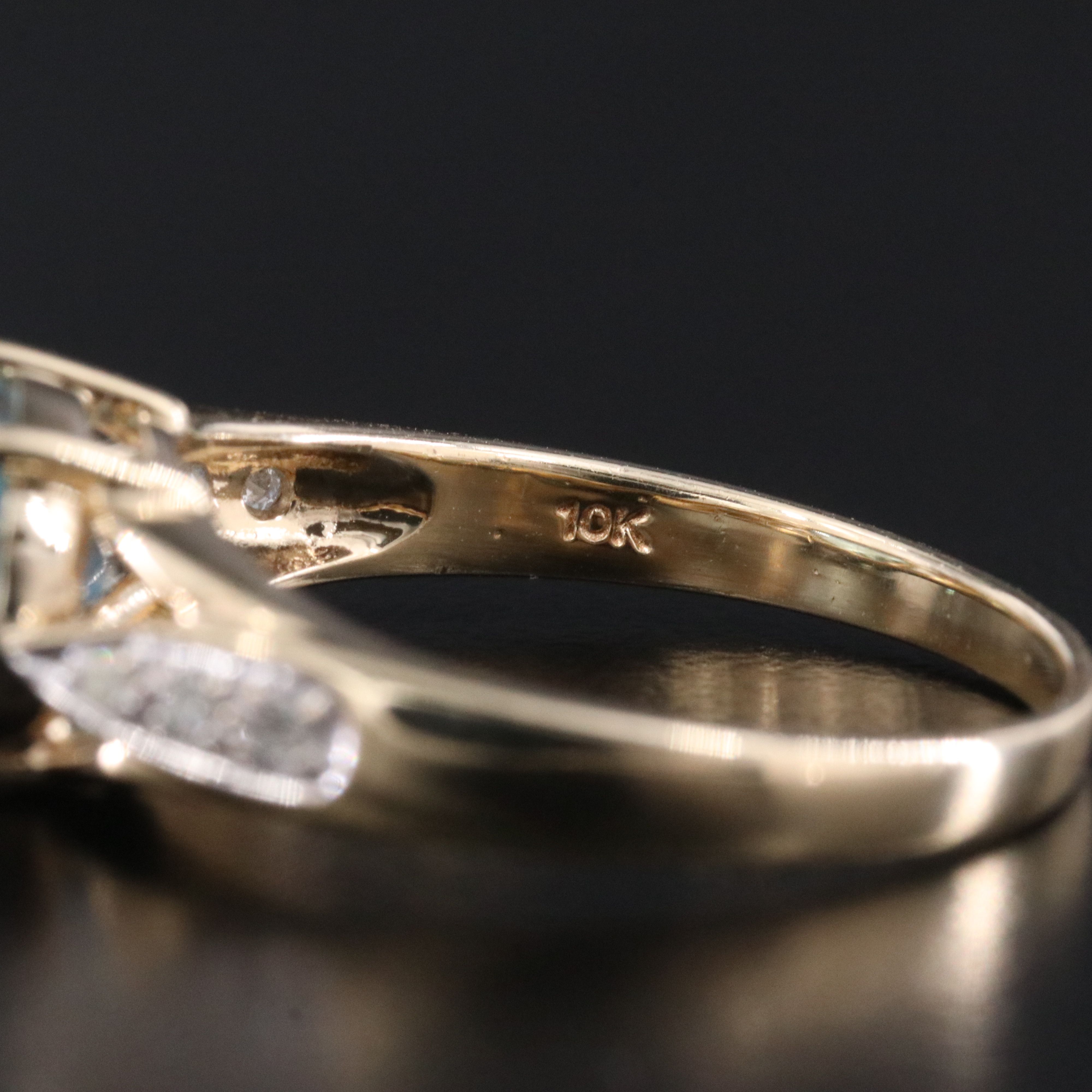 10K Swiss Blue Topaz and Diamond East West Ring