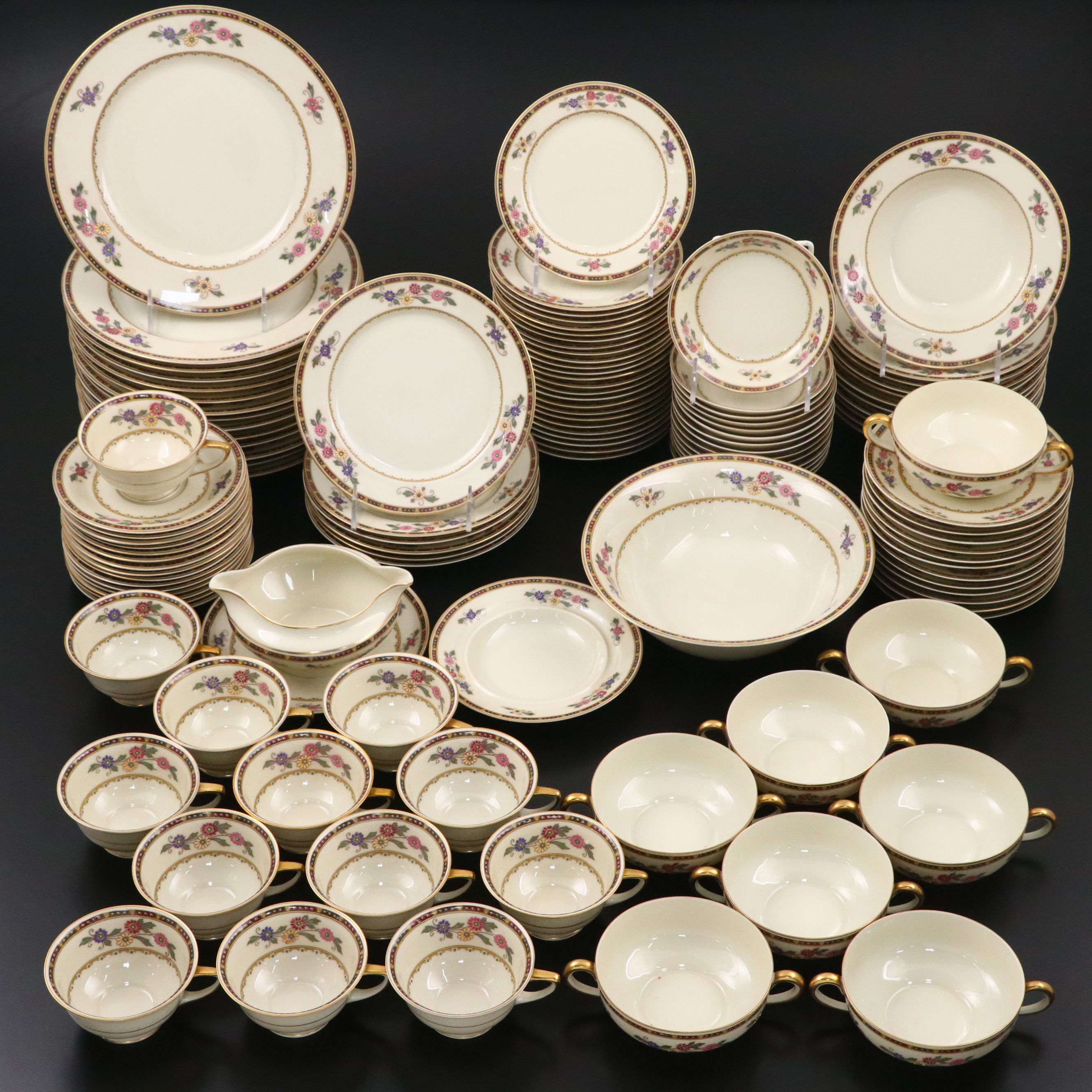 Heinrich & Co. Bavarian Gilt Floral Porcelain Dinnerware, 20th Century