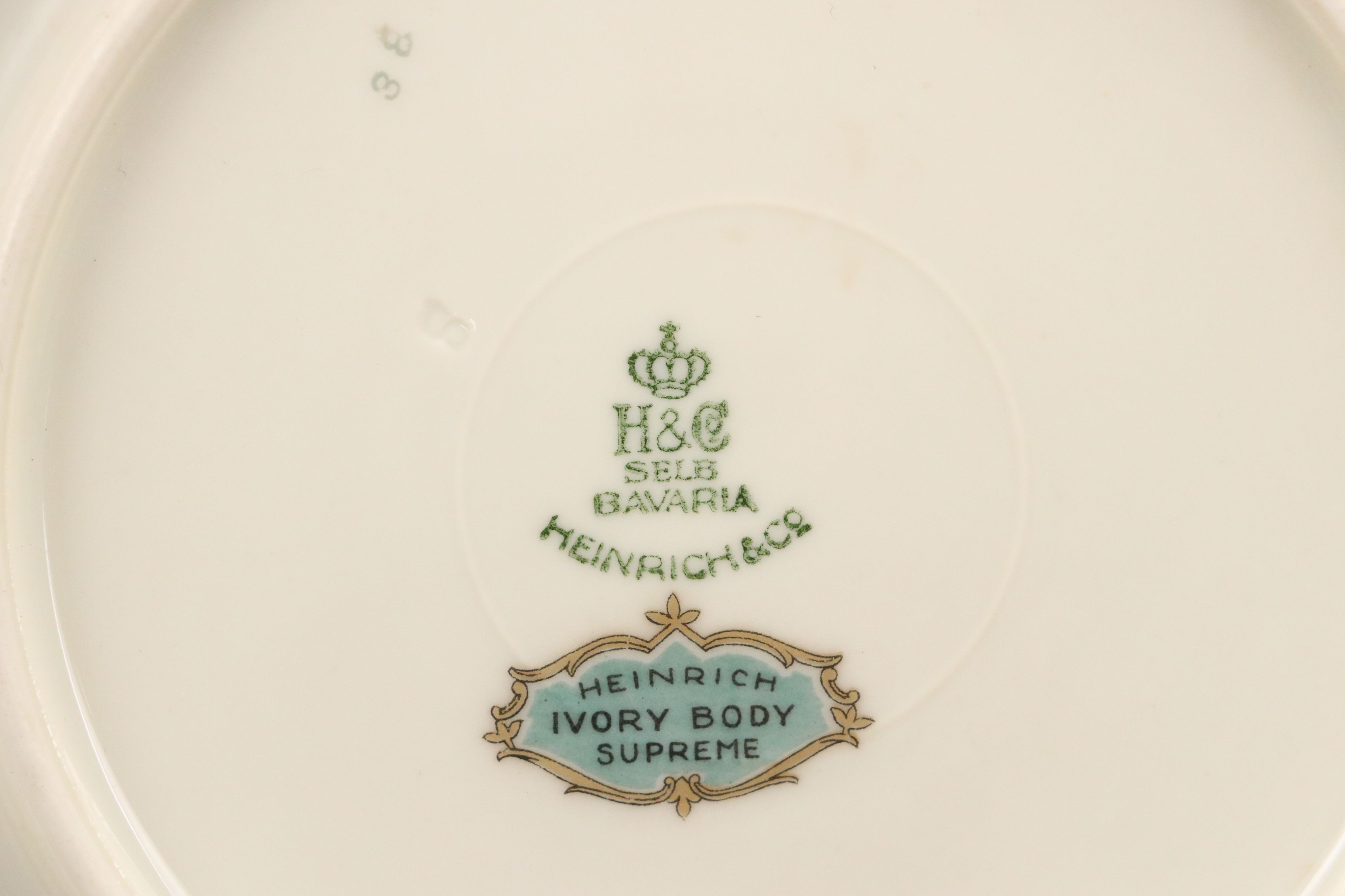 Heinrich & Co. Bavarian Gilt Floral Porcelain Dinnerware, 20th Century