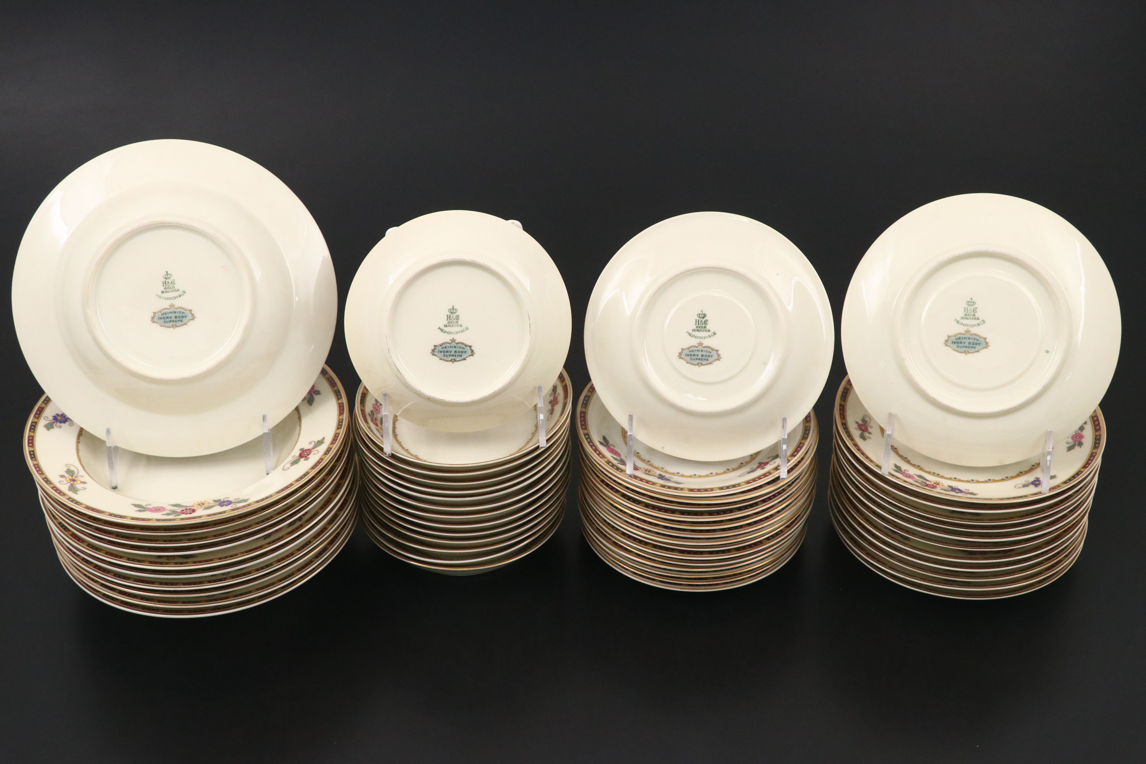 Heinrich & Co. Bavarian Gilt Floral Porcelain Dinnerware, 20th Century