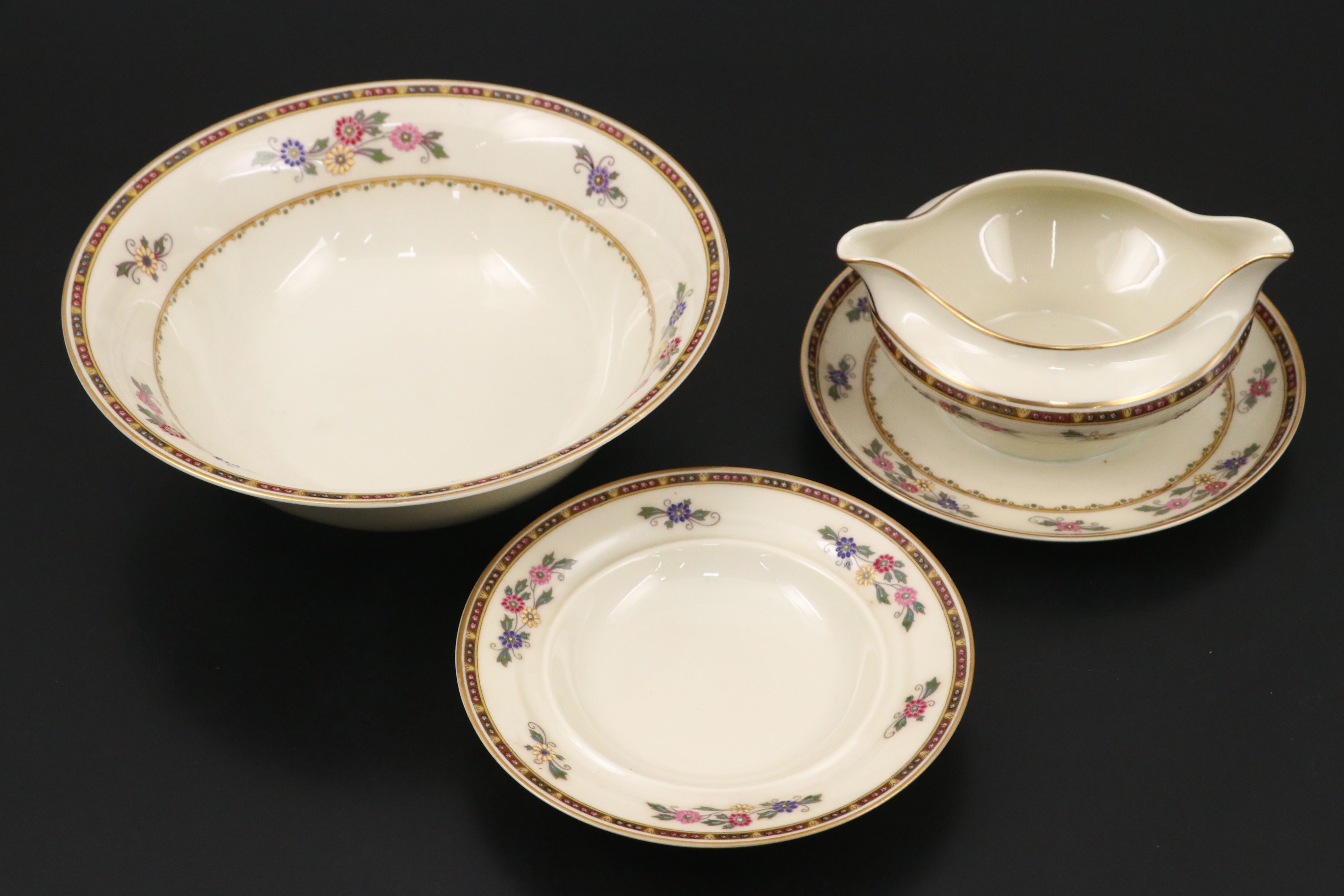 Heinrich & Co. Bavarian Gilt Floral Porcelain Dinnerware, 20th Century