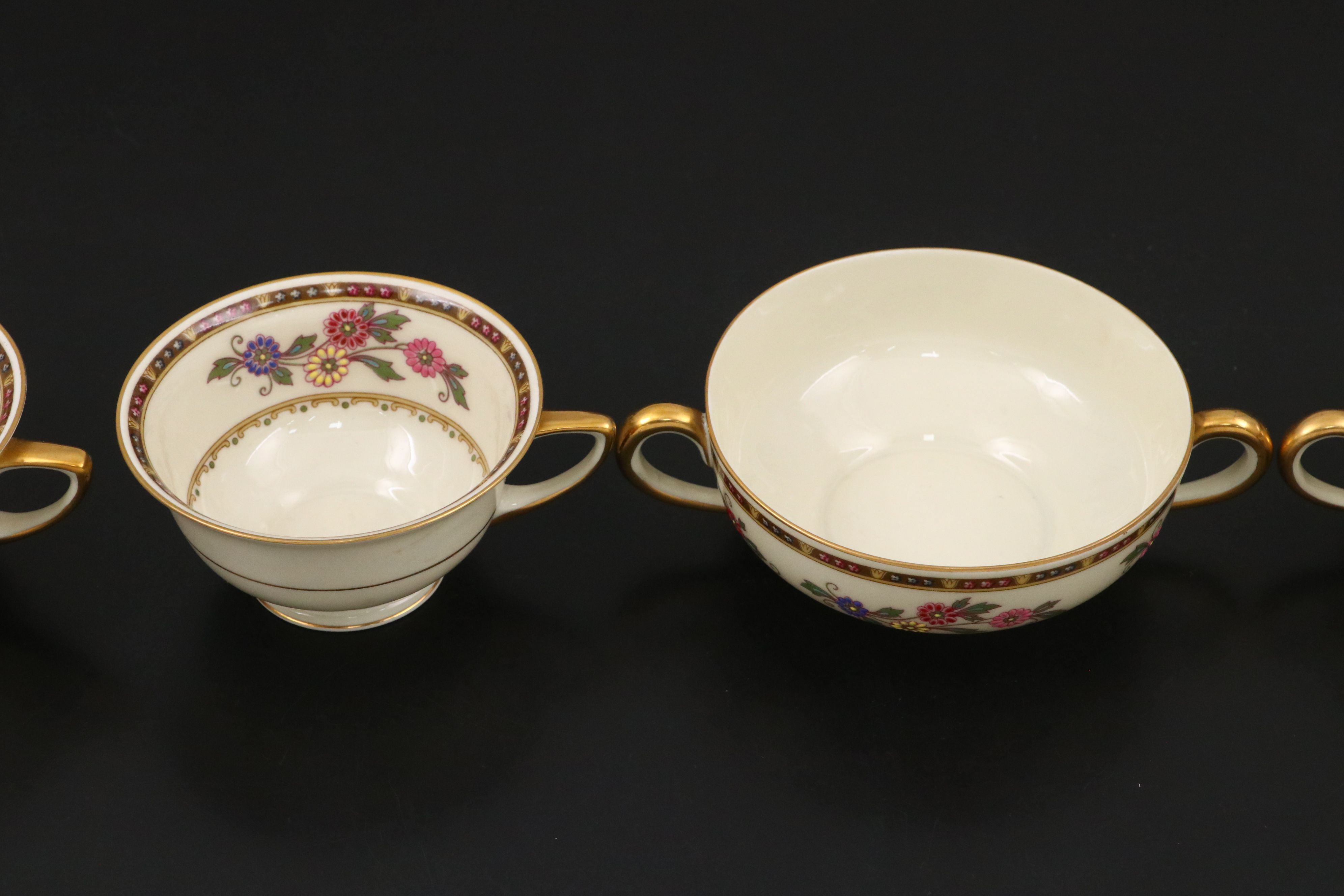 Heinrich & Co. Bavarian Gilt Floral Porcelain Dinnerware, 20th Century