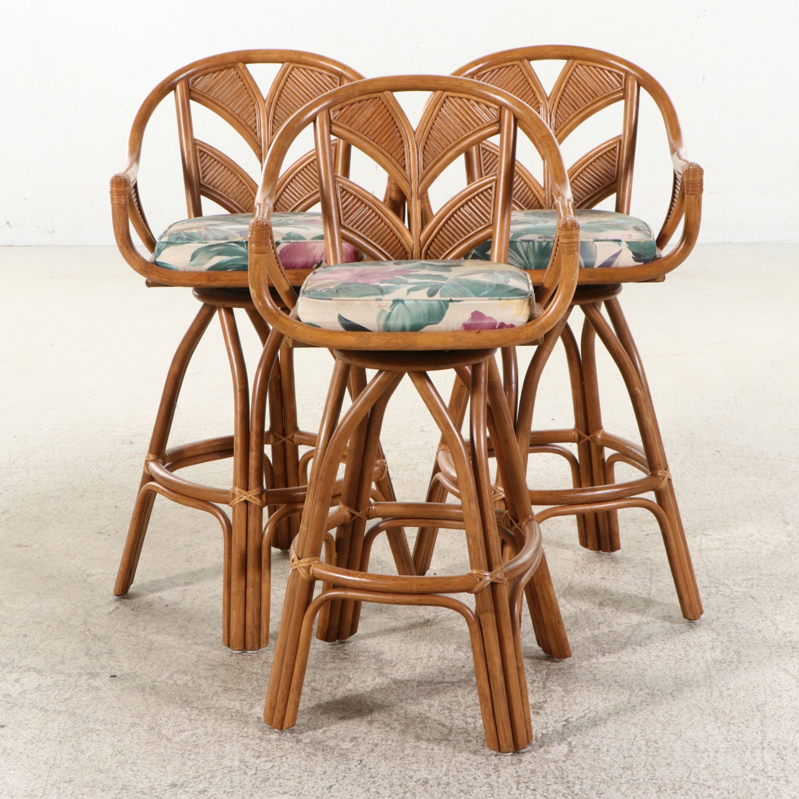 Set of Three Rattan Swivel Barstools with Wheat Back and Floral Cushions