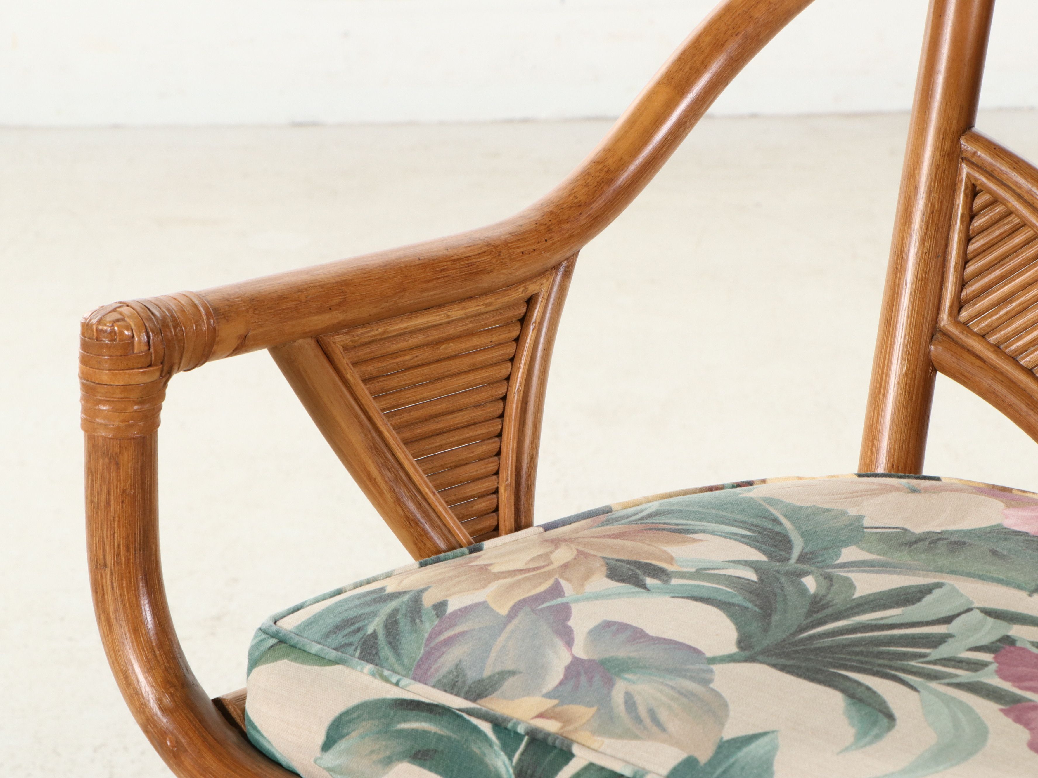 Set of Three Rattan Swivel Barstools with Wheat Back and Floral Cushions