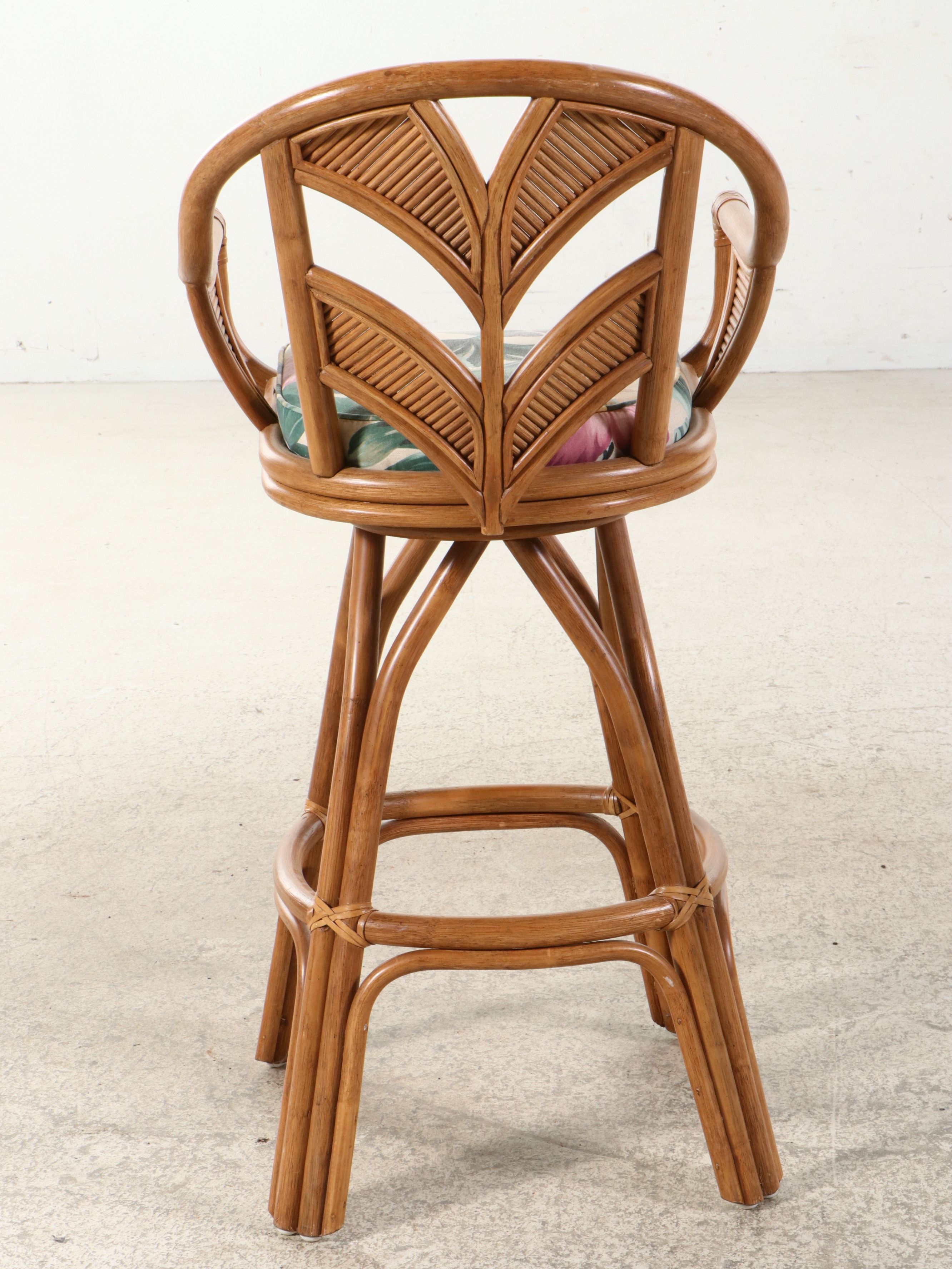 Set of Three Rattan Swivel Barstools with Wheat Back and Floral Cushions