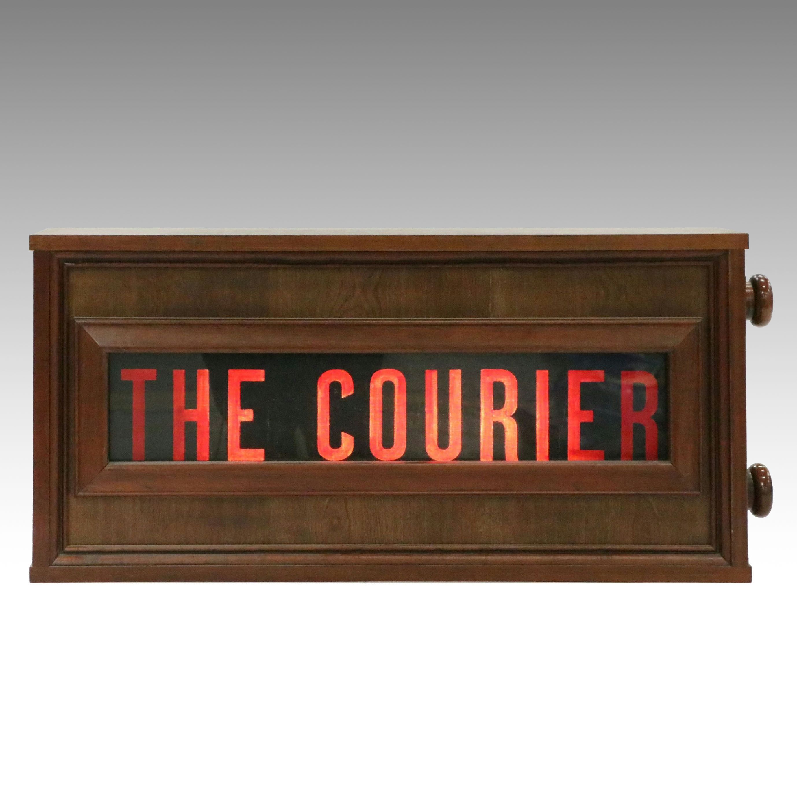 Illuminated "The Courier" Newspaper Advertising Sign