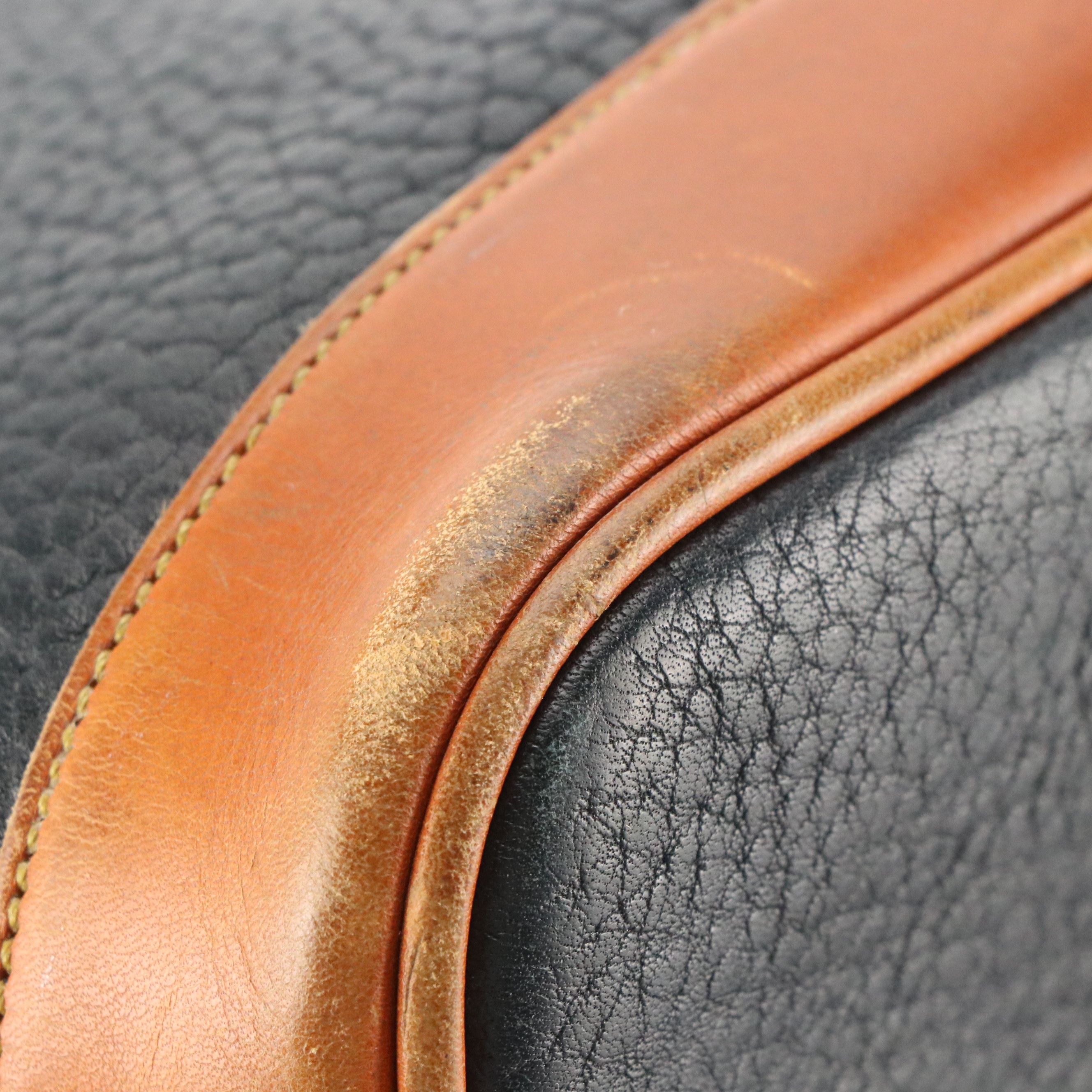 Dooney & Bourke Drawstring Bucket Bag in Navy Blue All-Weather & Brown Leather