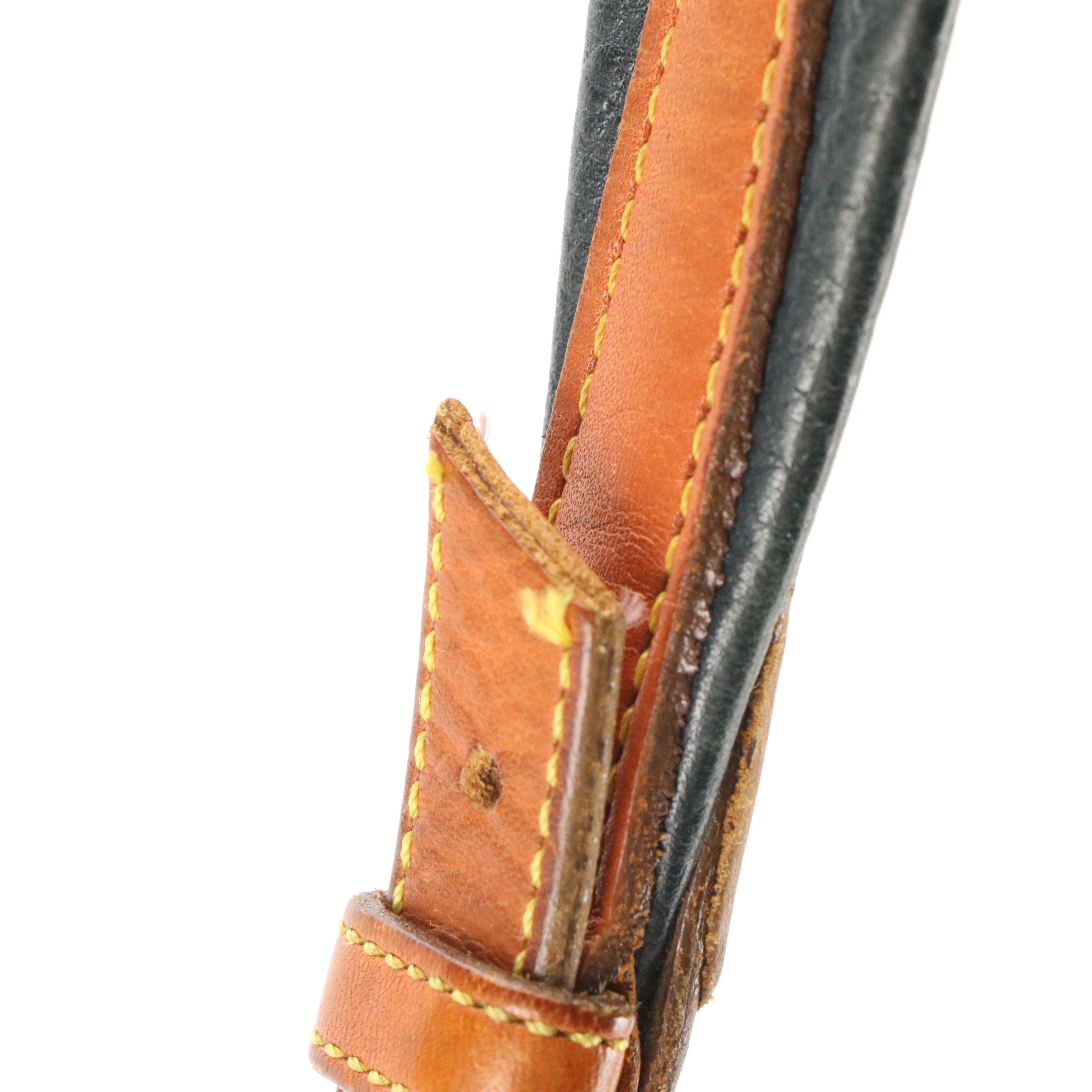 Dooney & Bourke Drawstring Bucket Bag in Navy Blue All-Weather & Brown Leather