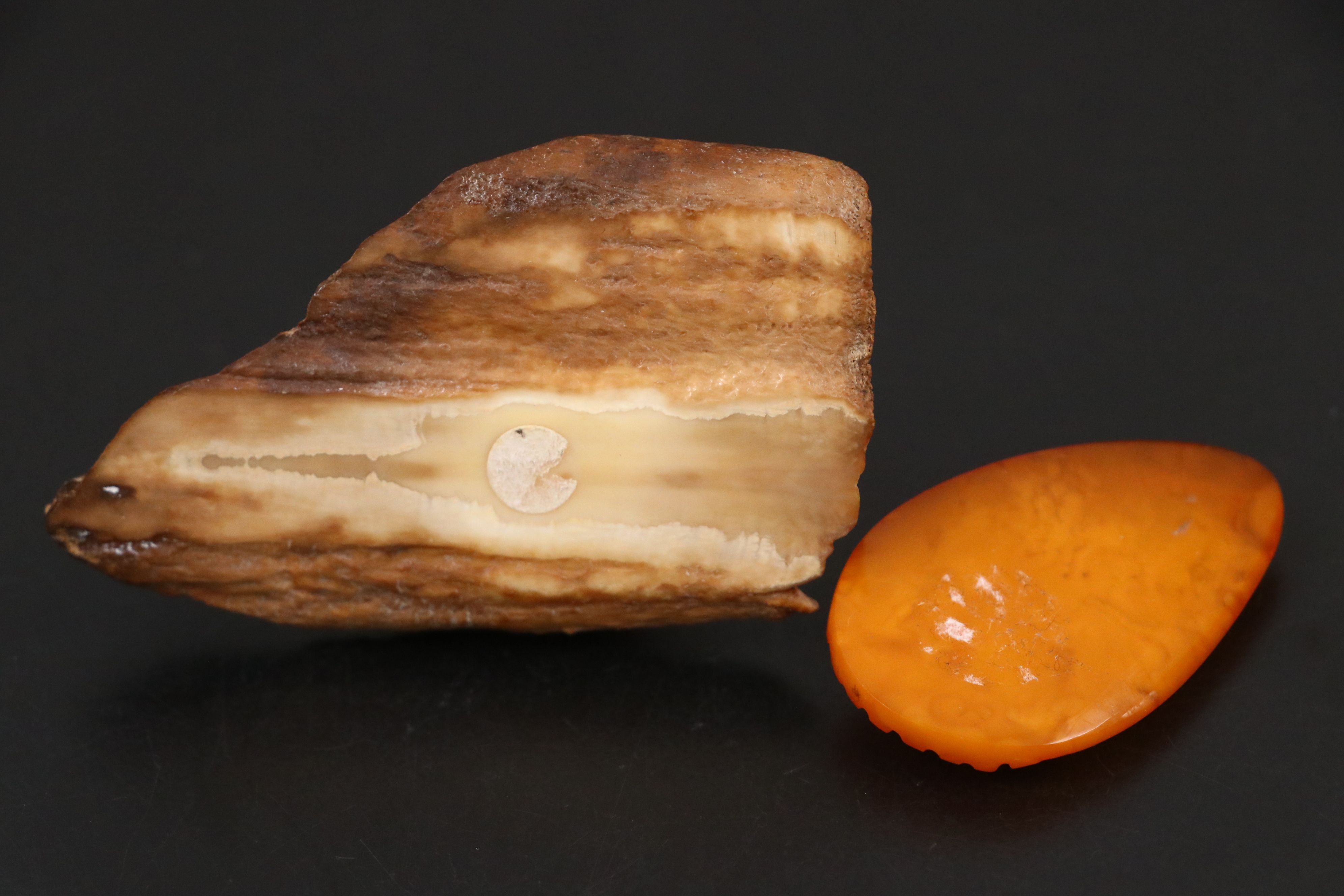 Chinese Mutton Fat Amber Seated Buddha with Other Amber Carvings