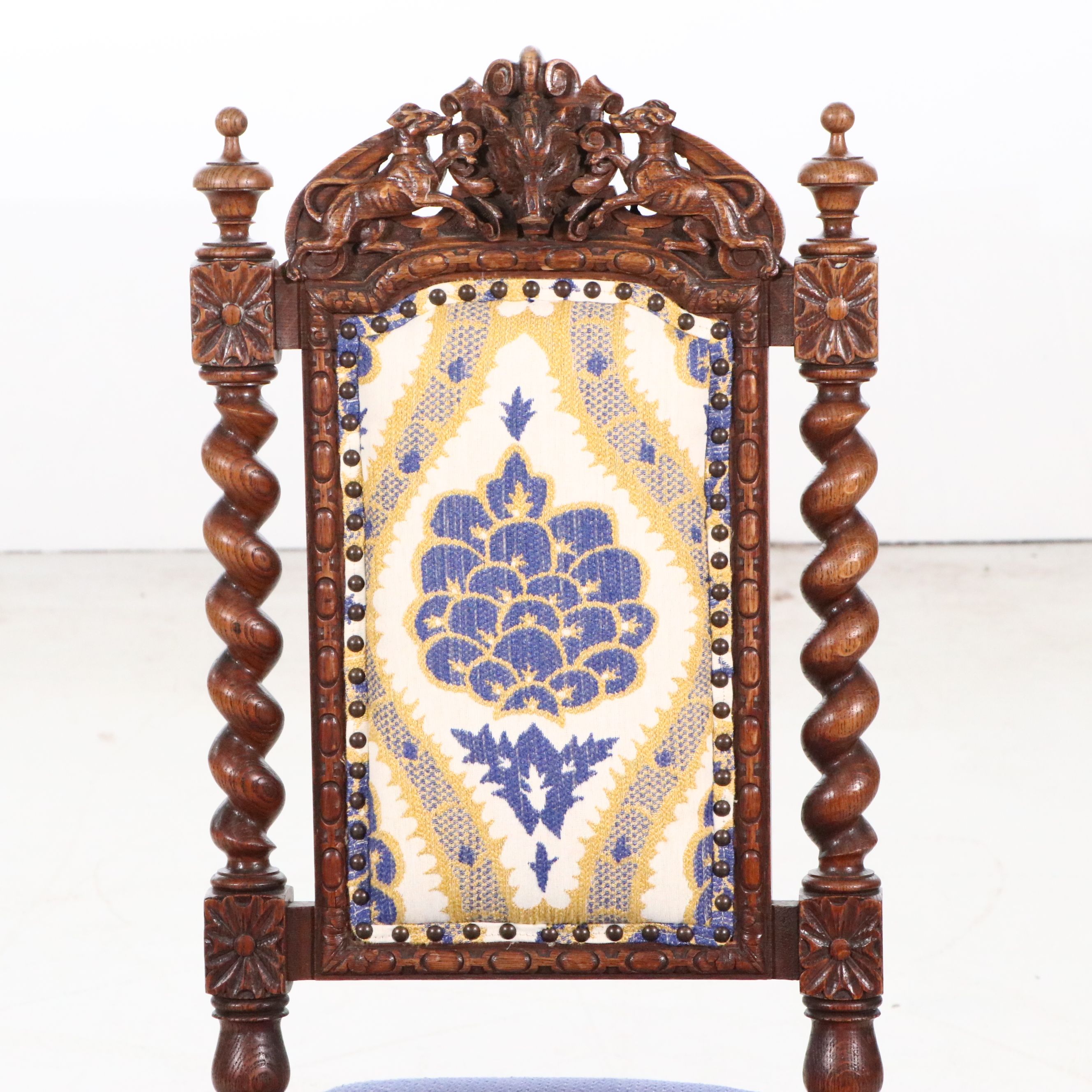 Set of Four Flemish Renaissance Revival Carved Oak Side Chairs