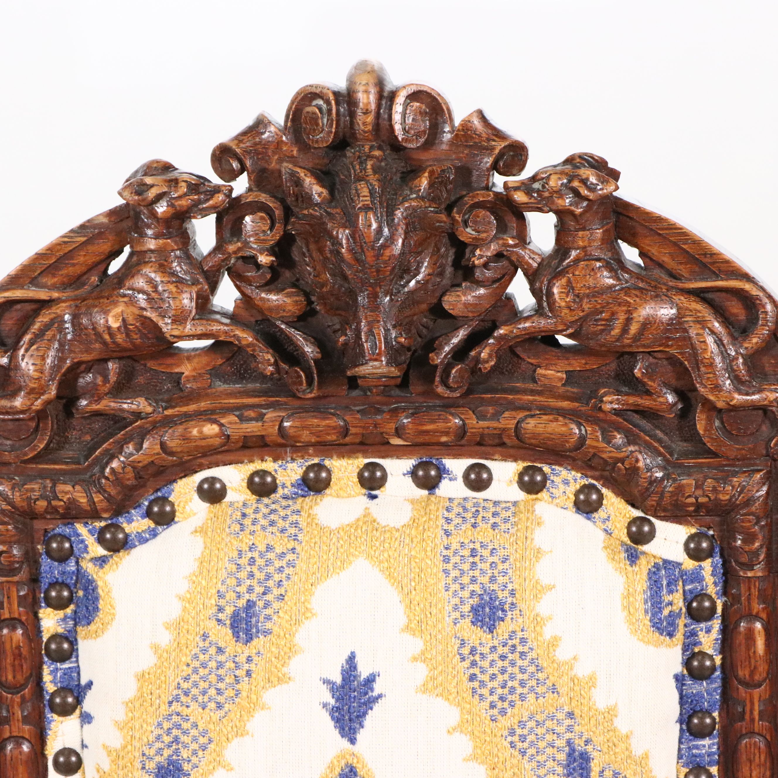 Set of Four Flemish Renaissance Revival Carved Oak Side Chairs