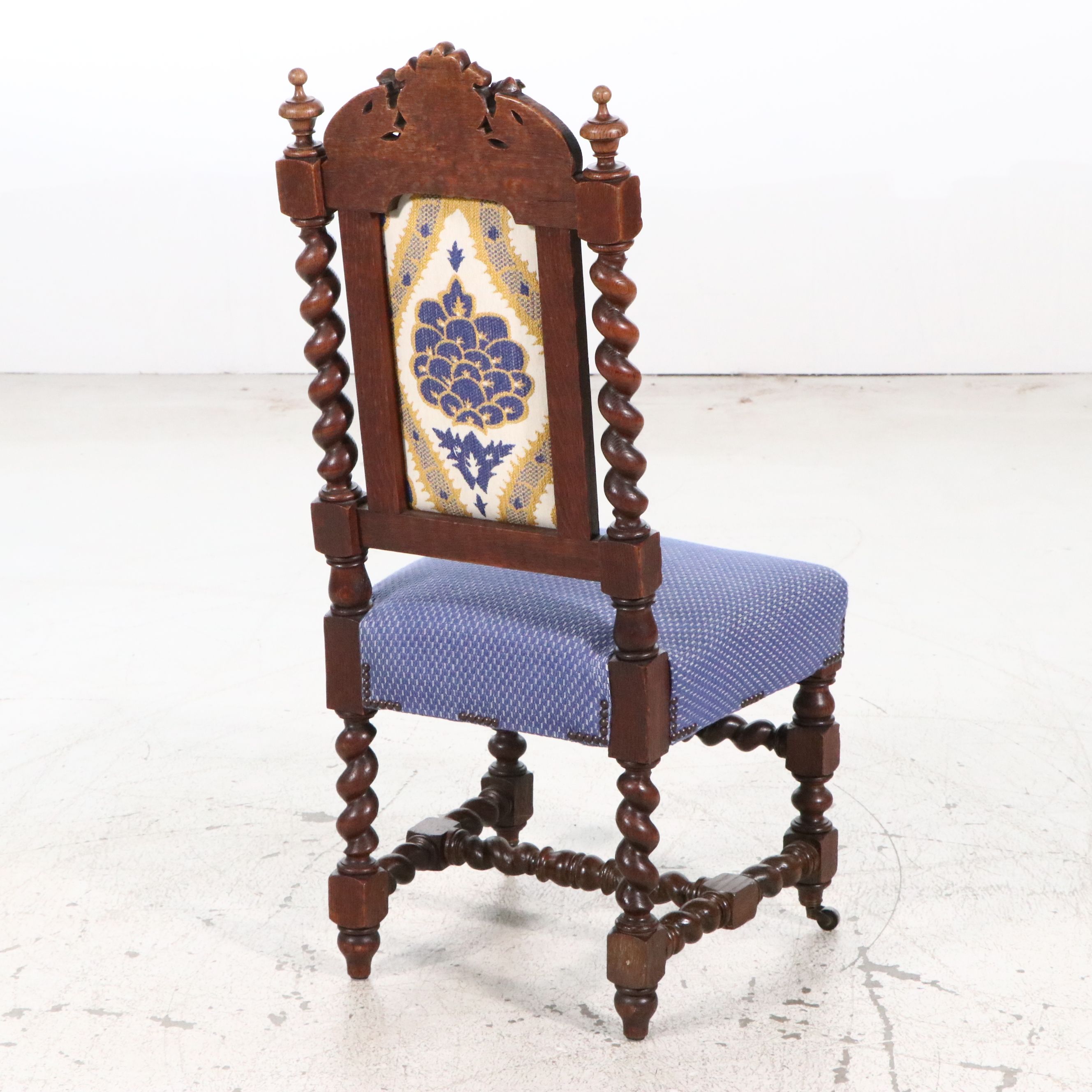 Set of Four Flemish Renaissance Revival Carved Oak Side Chairs