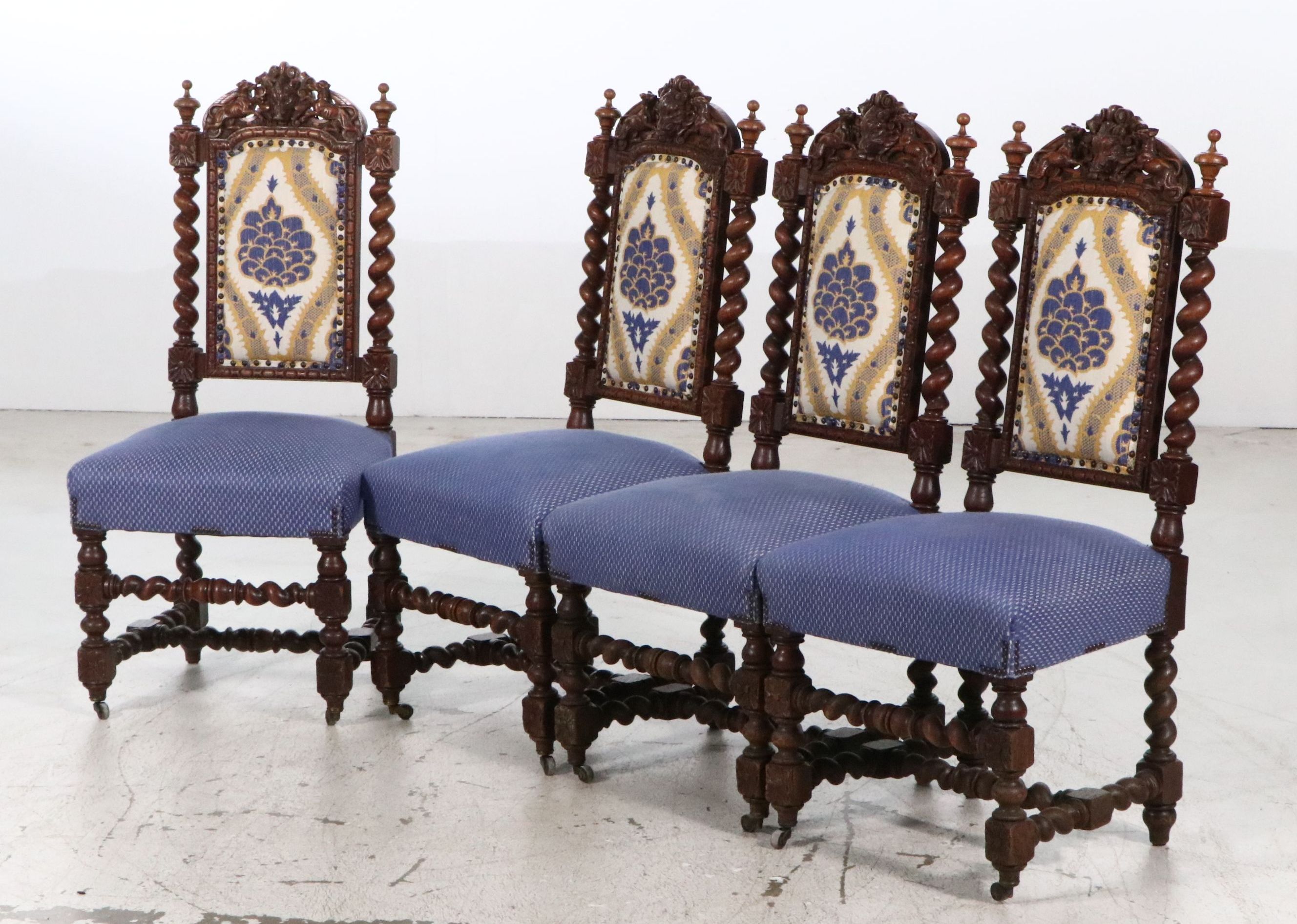 Set of Four Flemish Renaissance Revival Carved Oak Side Chairs