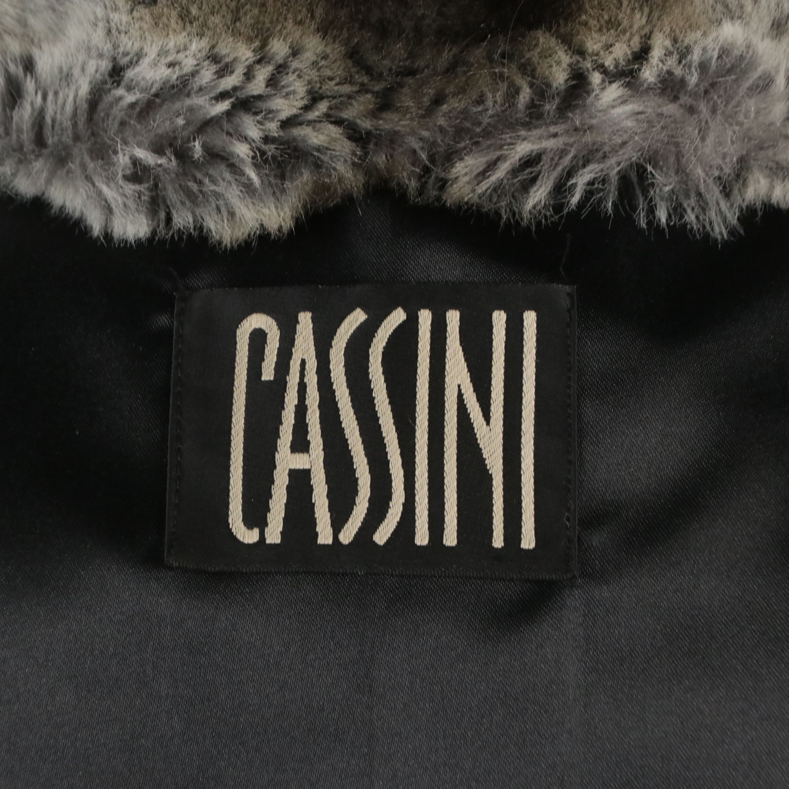 Oleg Cassini and Cejon Faux Fur Vests