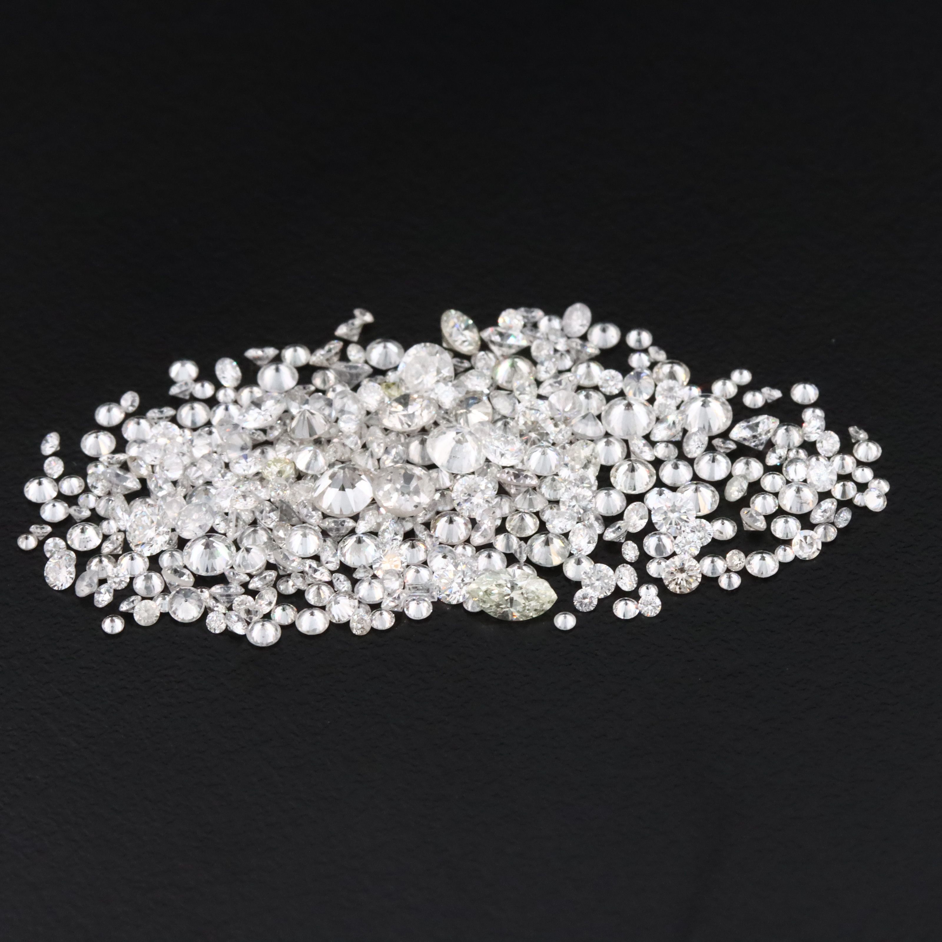 Loose 6.76 CTW Diamond Lot with Fancy Yellow Diamonds