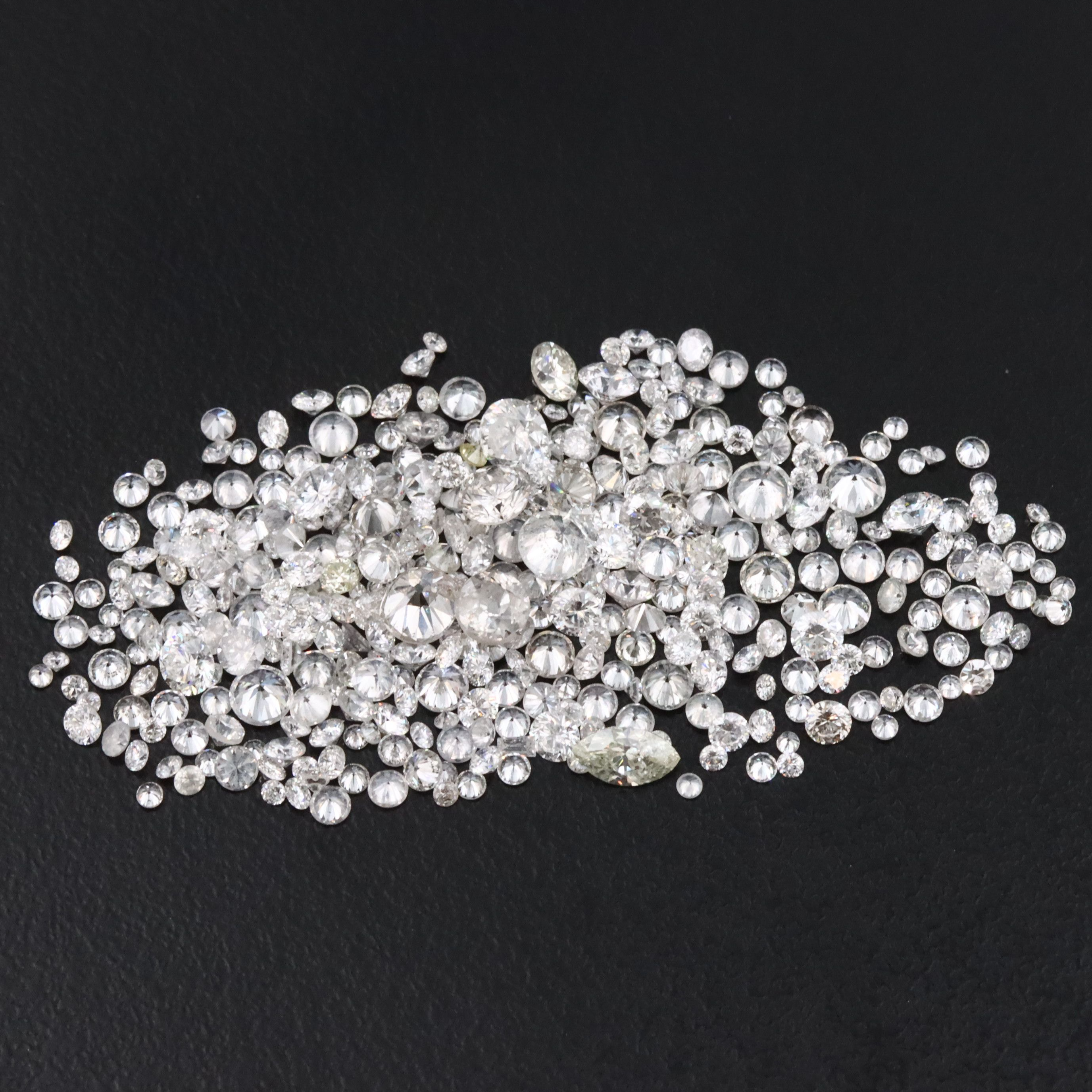 Loose 6.76 CTW Diamond Lot with Fancy Yellow Diamonds