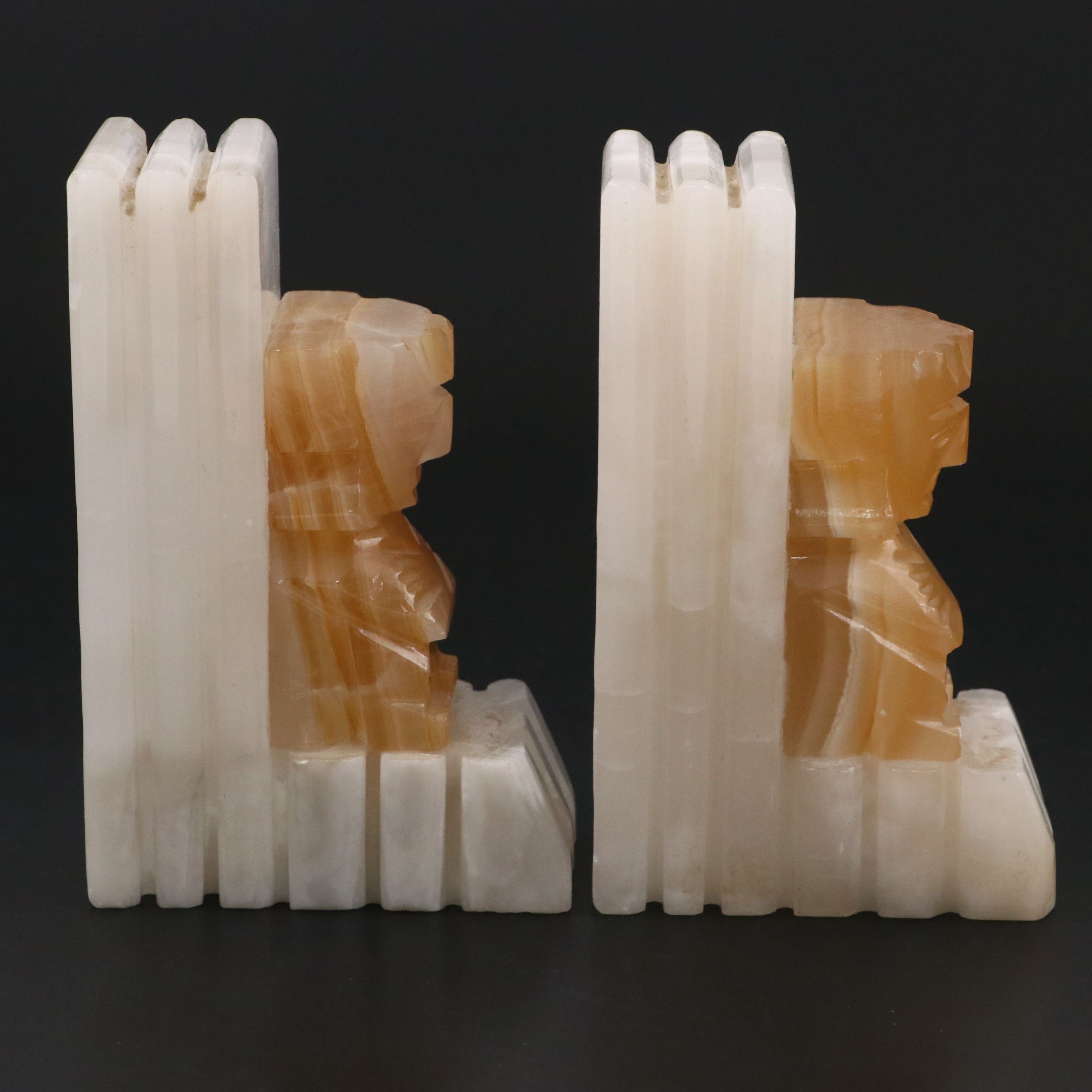Pair of Aztec Style Carved Calcite Figural Bookends