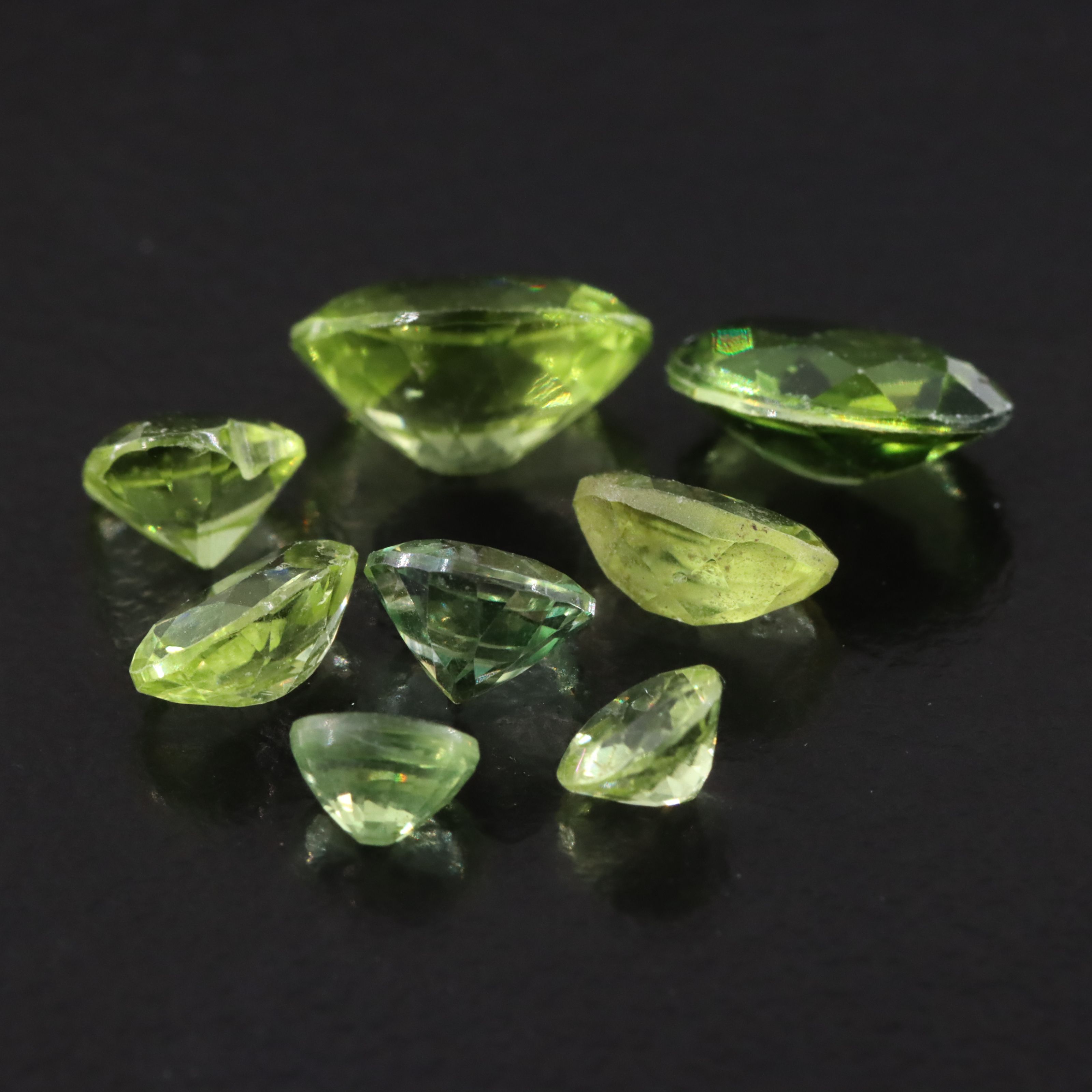 Loose 5.32 CTW Peridots and Lab Grown Spinels