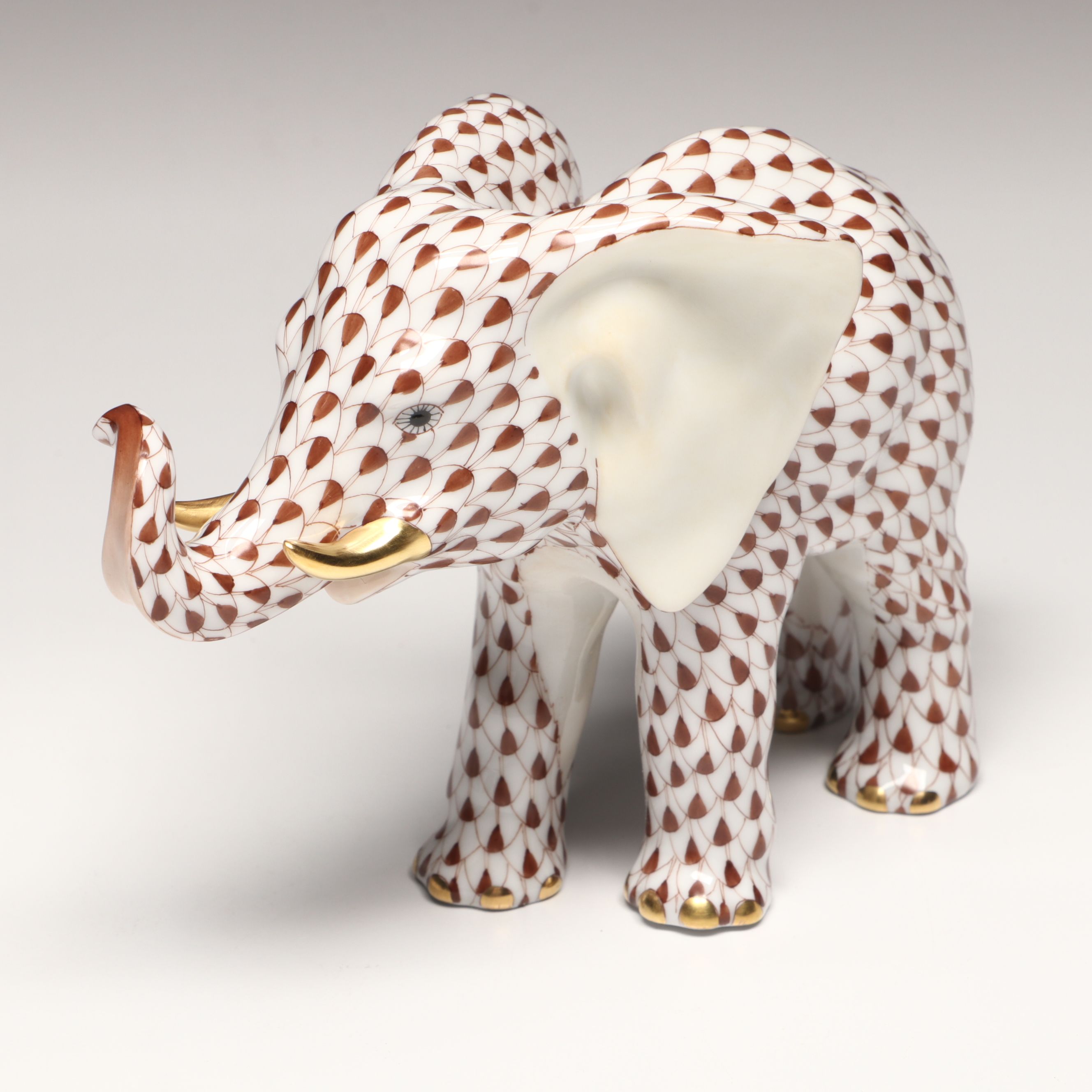 Herend Chocolate Fishnet with Gold "Roaming Elephant" Porcelain Figurine