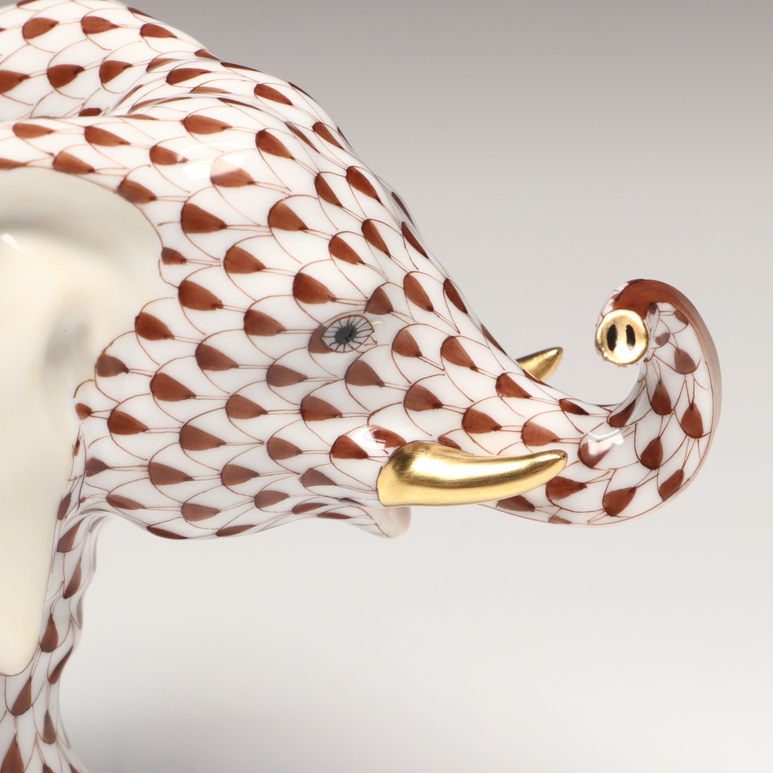 Herend Chocolate Fishnet with Gold "Roaming Elephant" Porcelain Figurine
