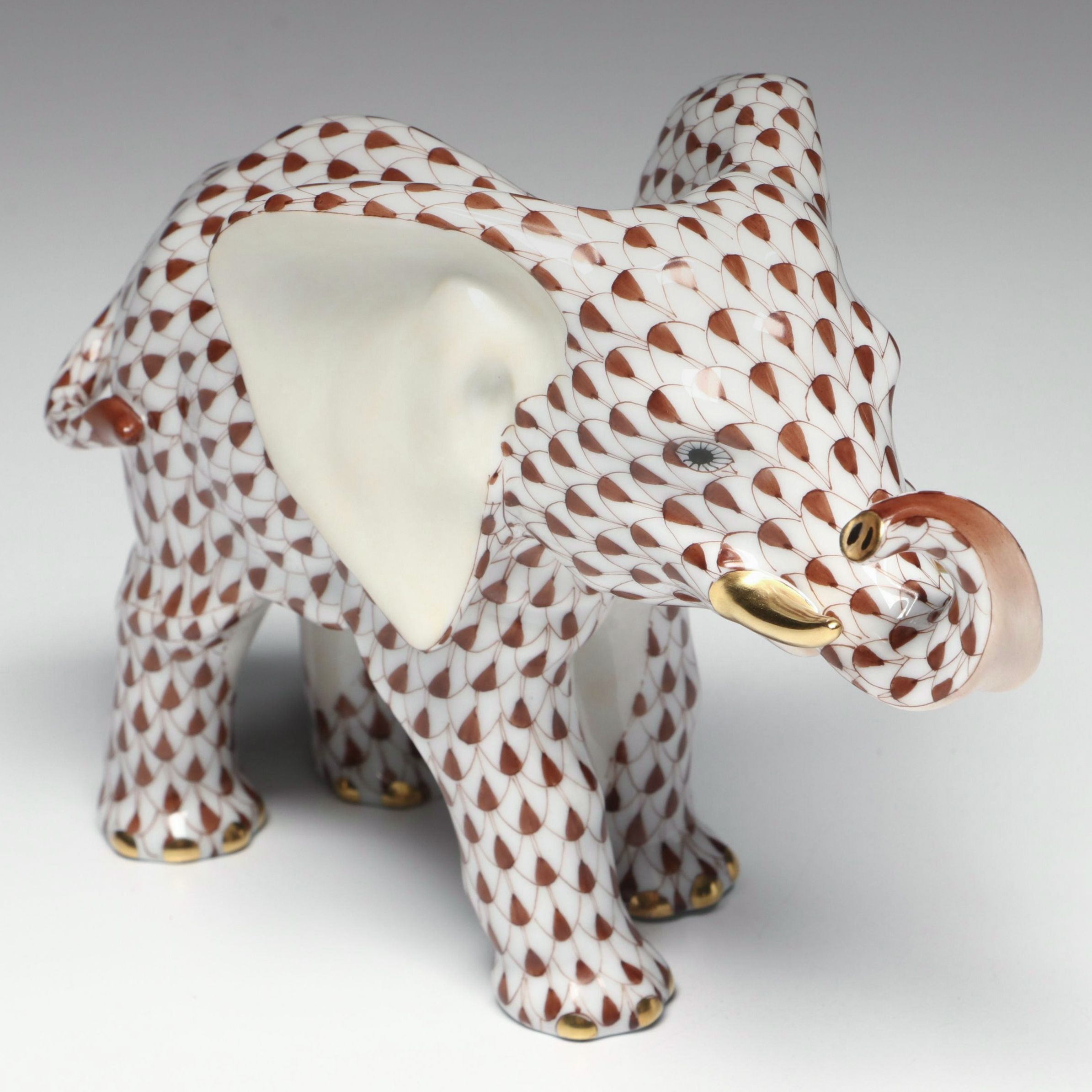 Herend Chocolate Fishnet with Gold "Roaming Elephant" Porcelain Figurine